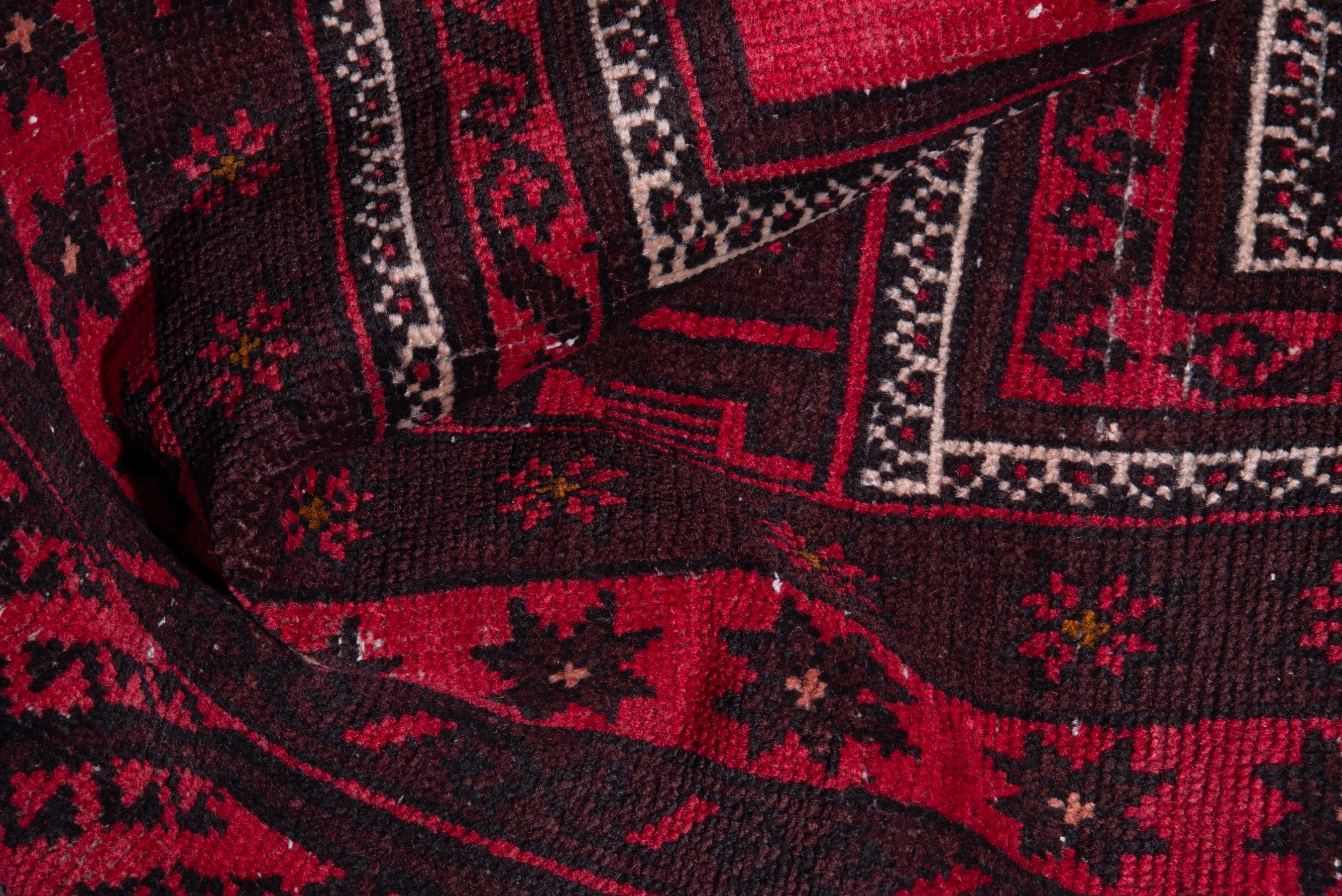 Persian Baluch area rug in deep red and burgundy, view 16 of 17