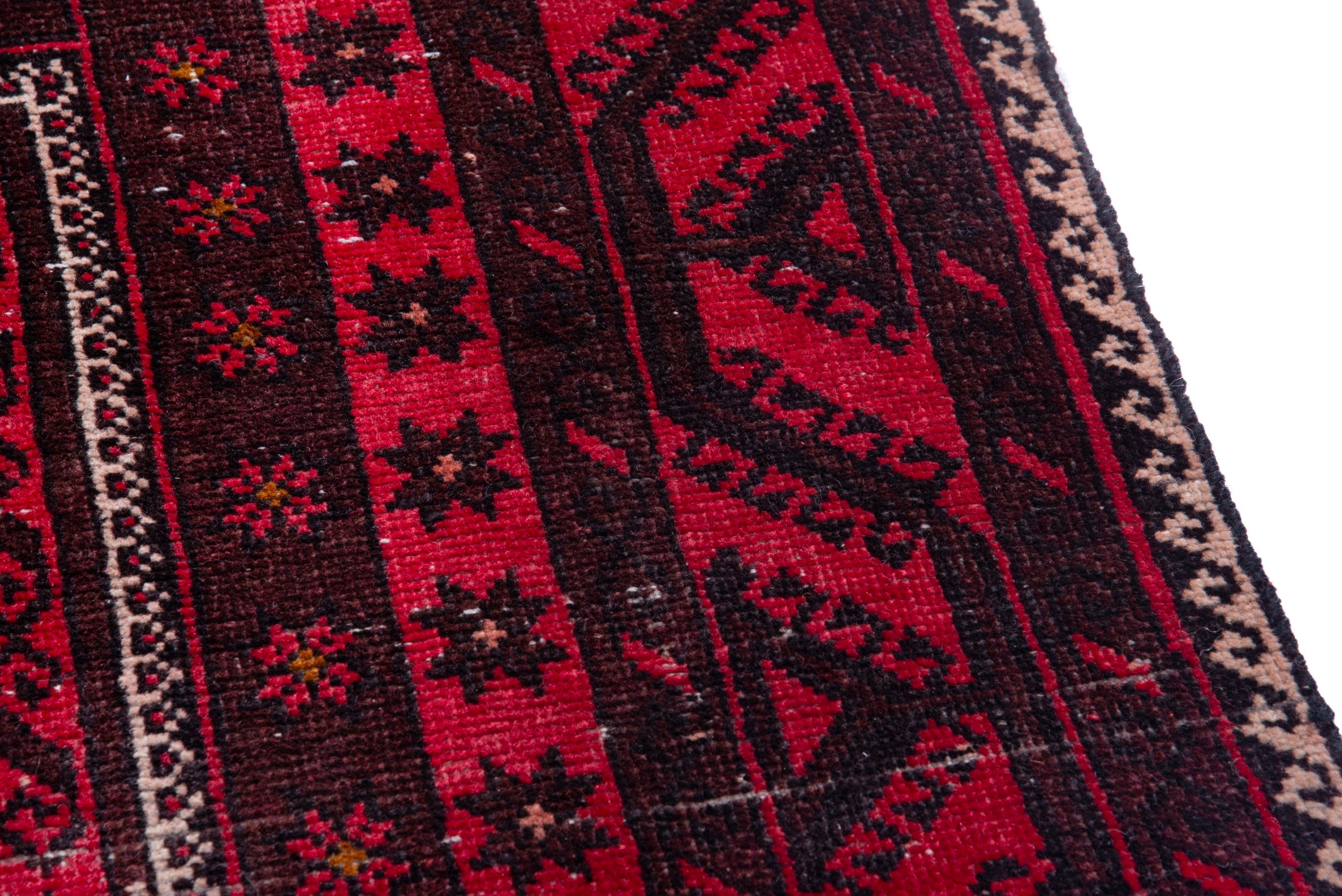 Persian Baluch area rug in deep red and burgundy, view 7 of 17