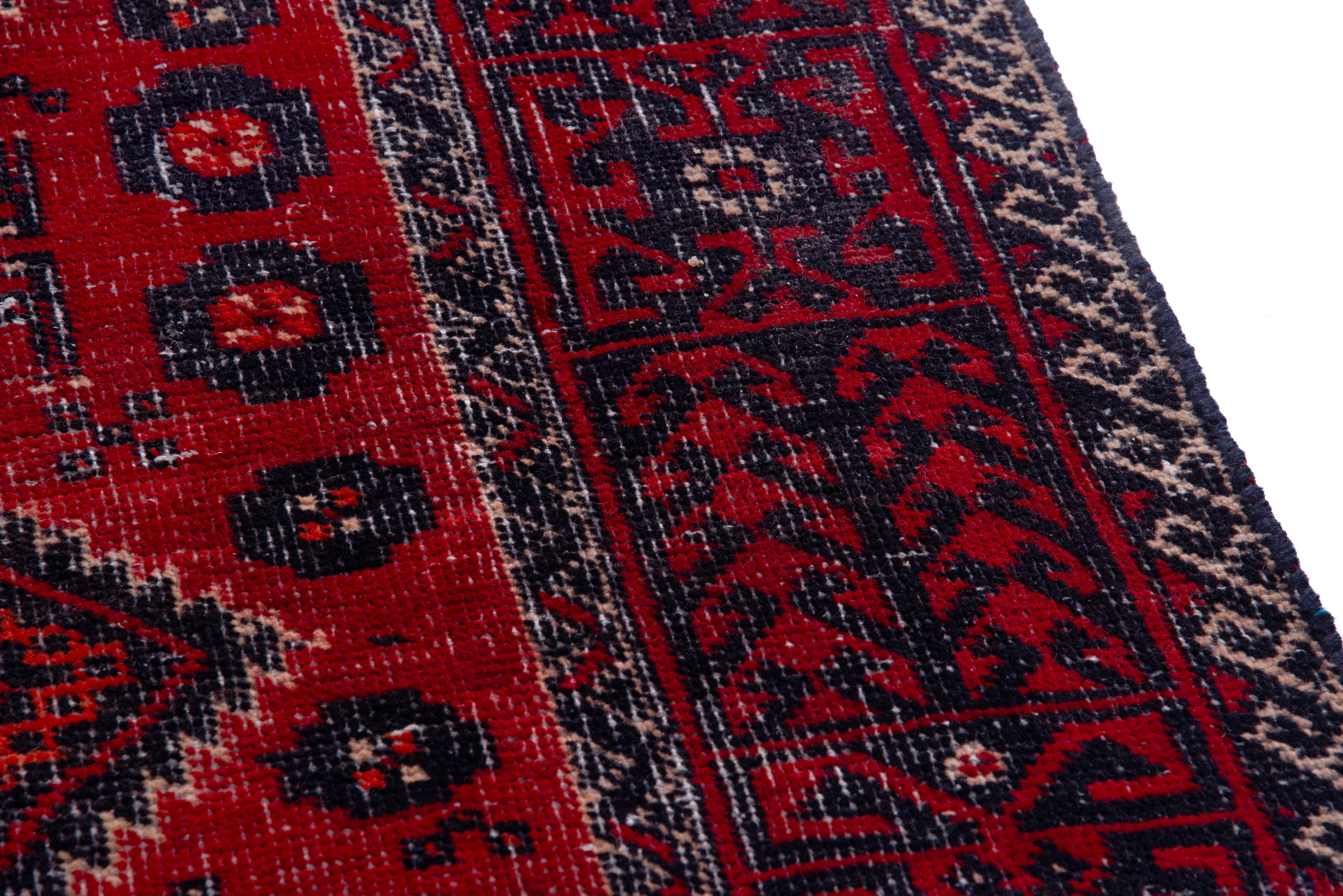 Persian Baluch accent rug in deep red and burgundy, view 7 of 16
