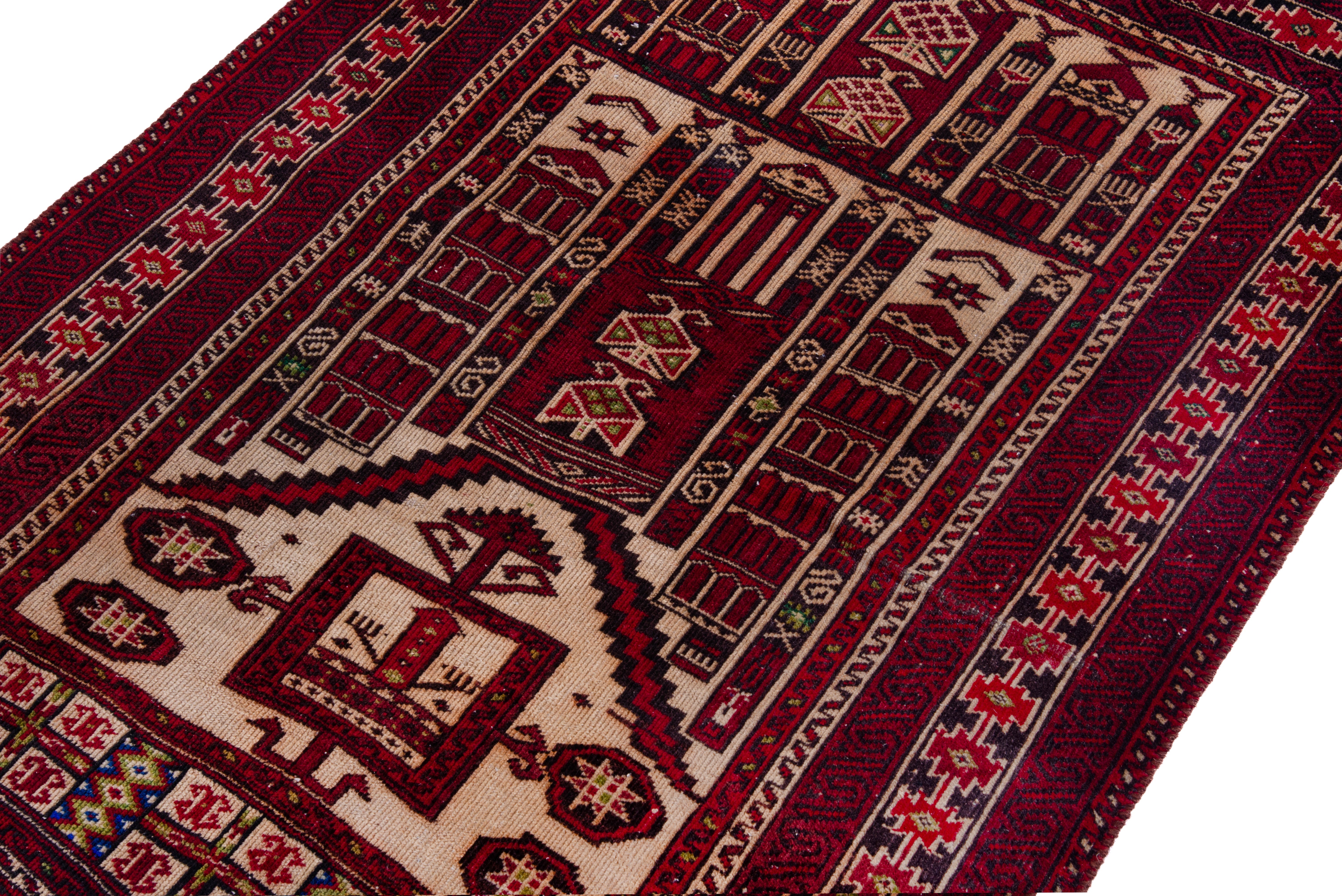 Persian Baluch accent rug in burgundy and cream, view 6 of 16