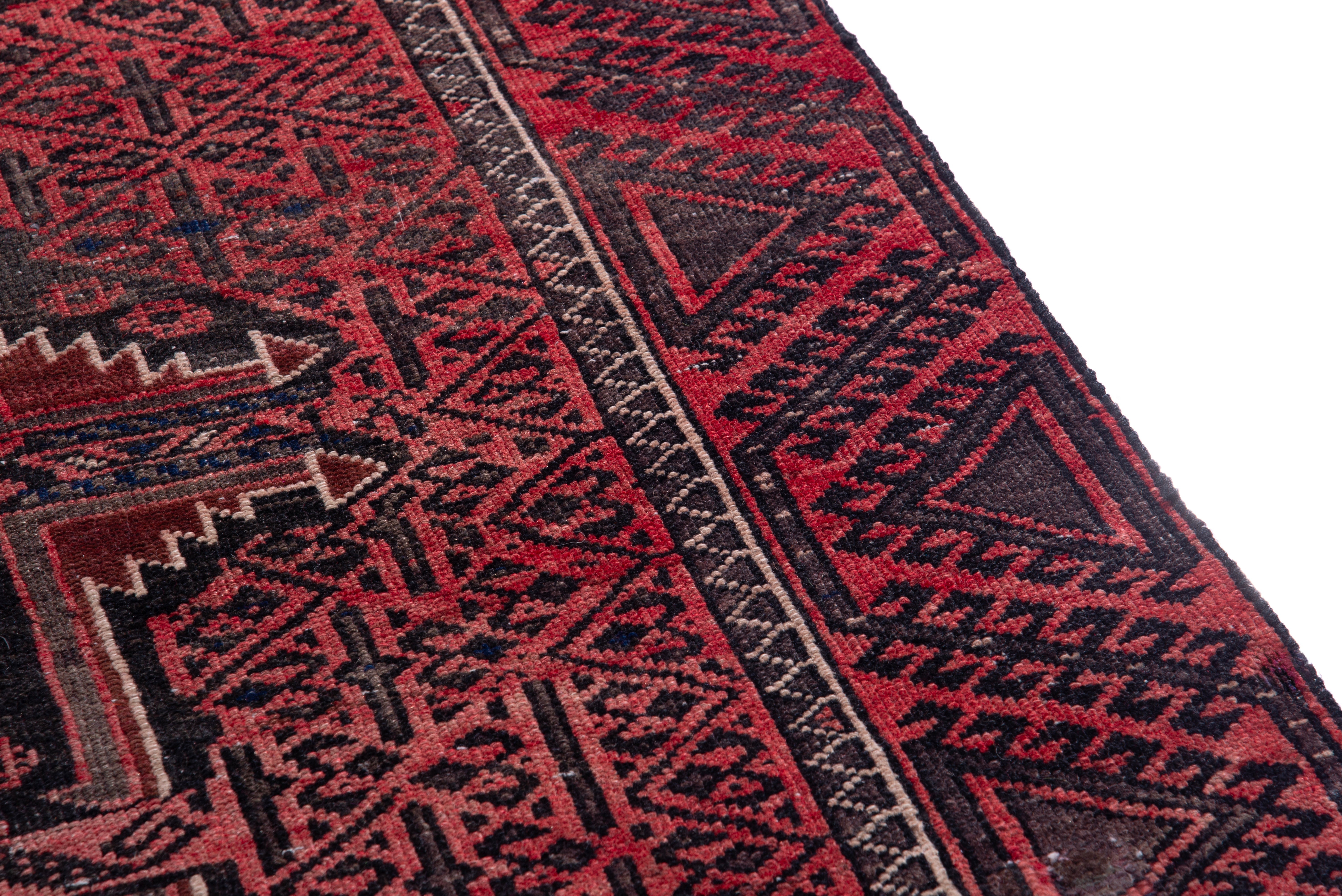 Persian Baluch accent rug in deep red and burgundy, view 7 of 16