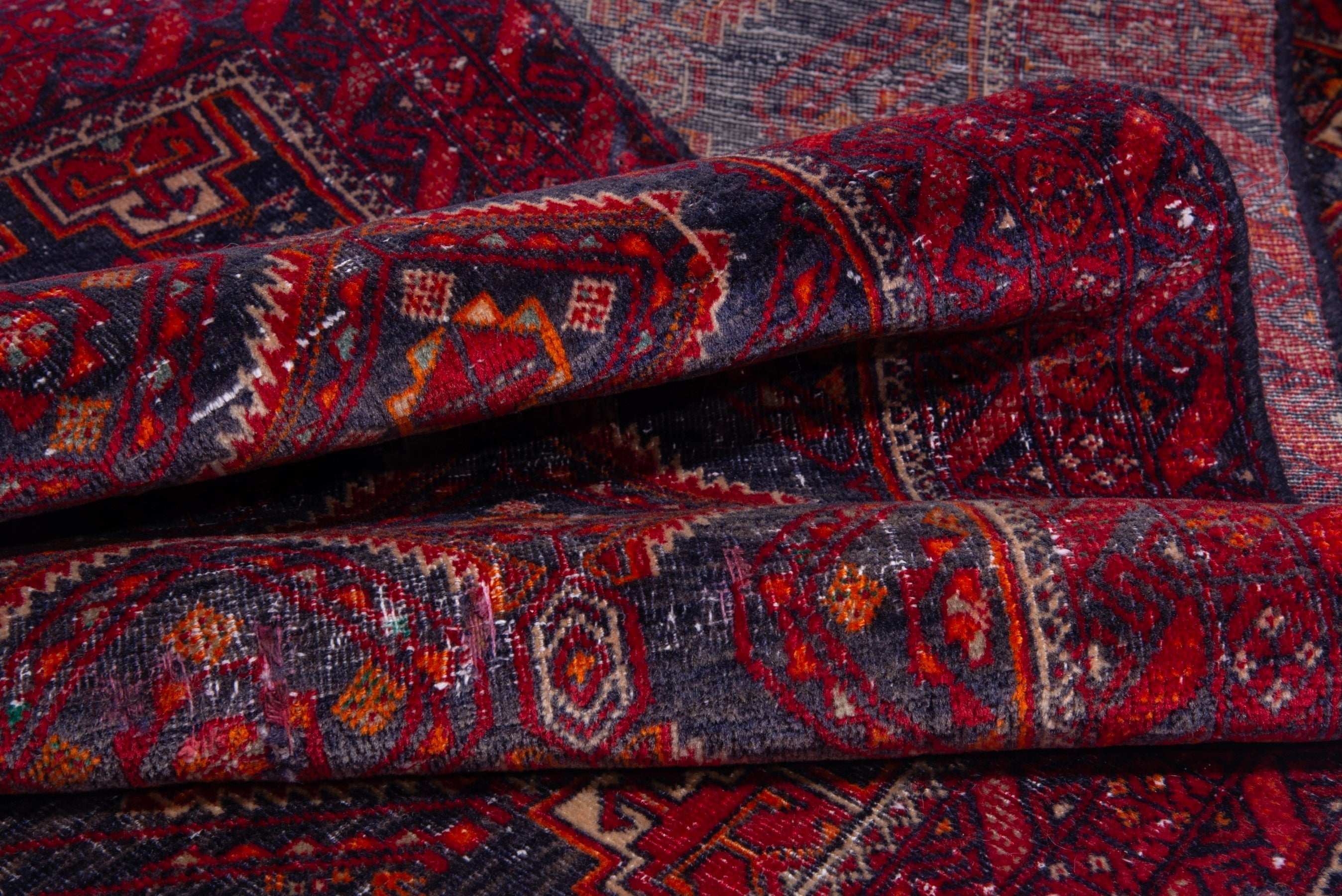 Persian Baluch accent rug in deep red and dark blue, view 13 of 15