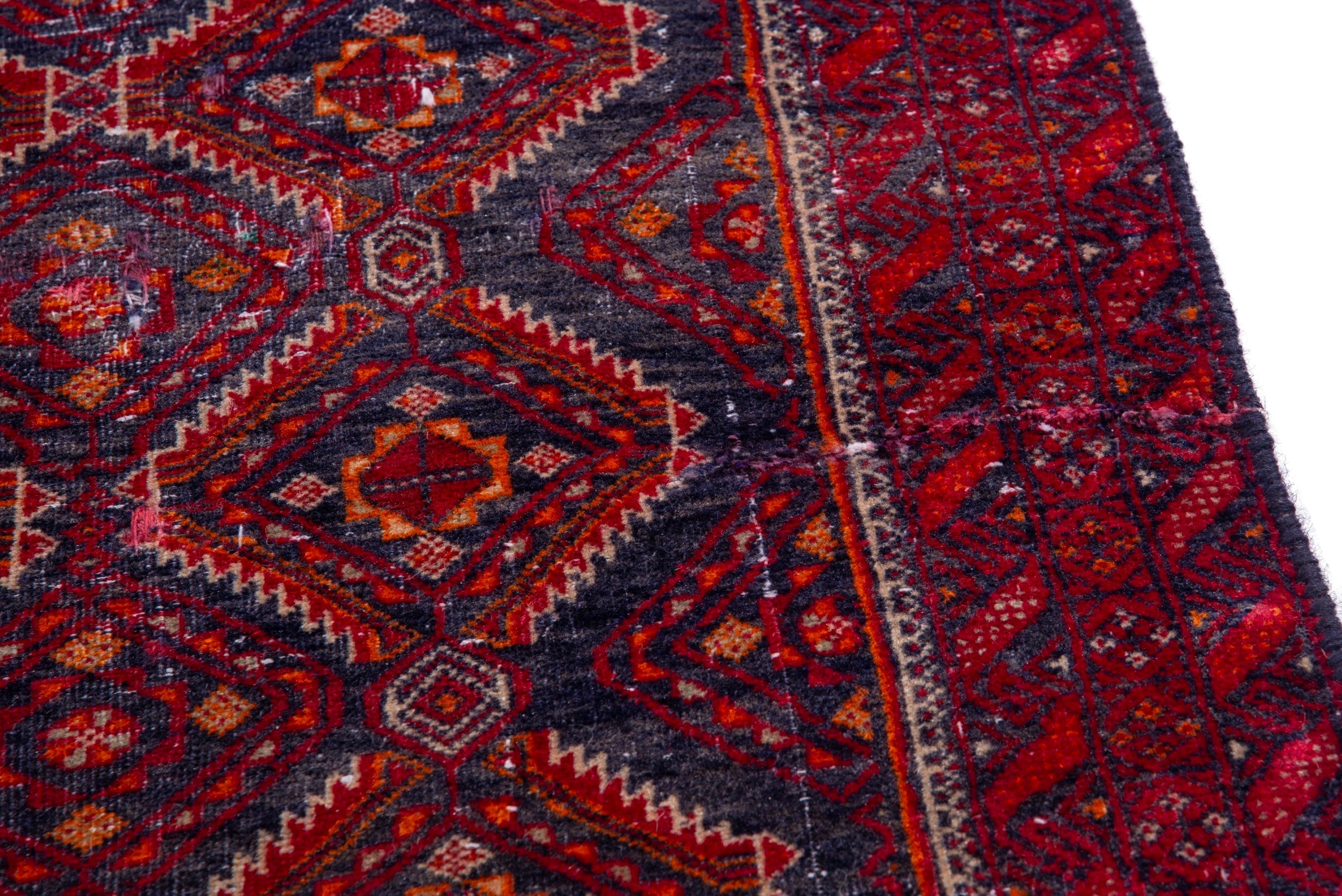 Persian Baluch accent rug in deep red and dark blue, view 7 of 15
