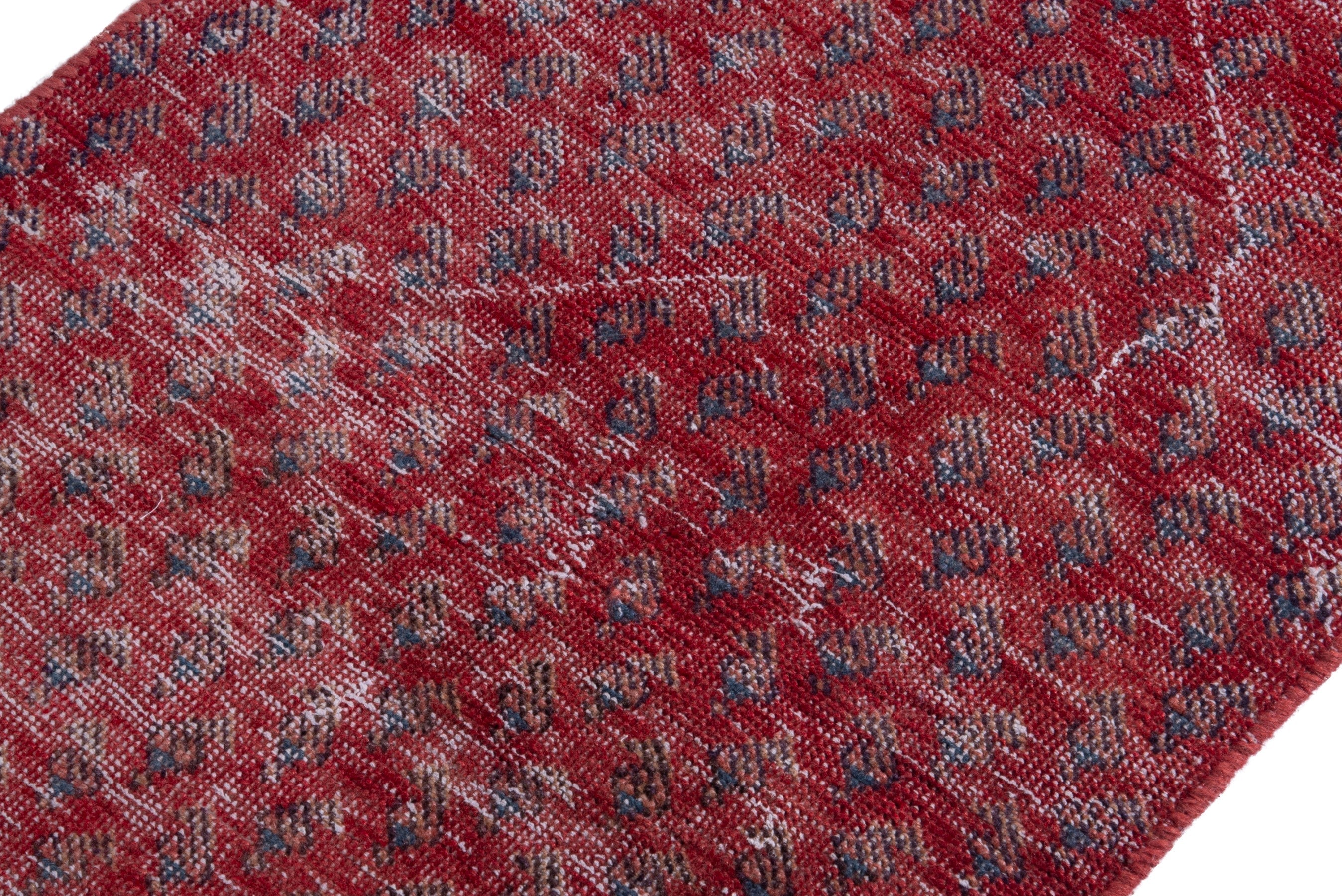Persian Botteh runner rug in faded red and deep red, view 6 of 16