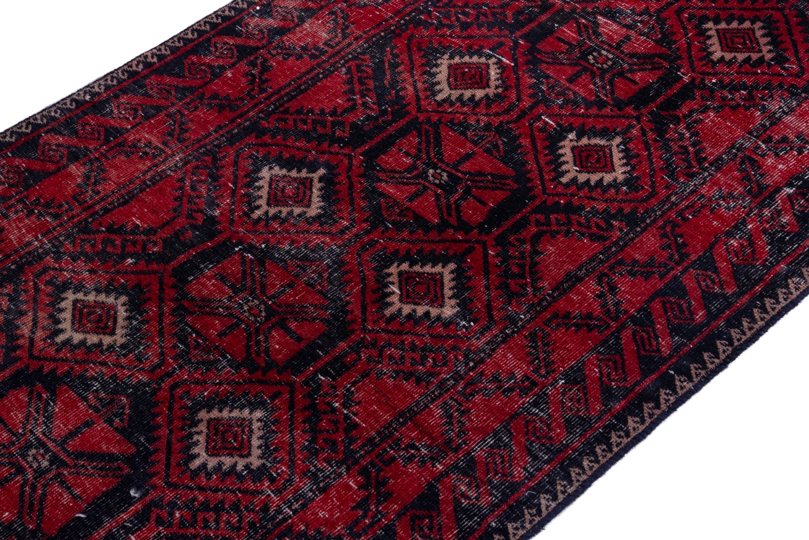 Persian Baluch runner rug in deep red and burgundy, view 6 of 18