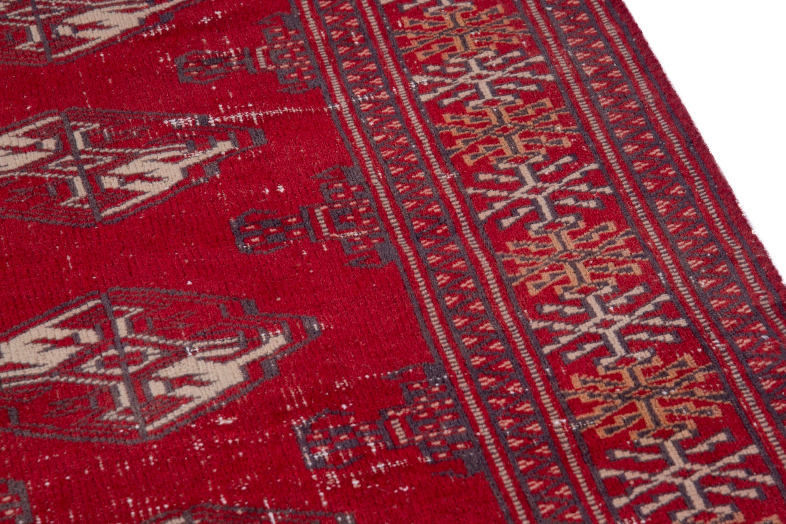 Persian Torkaman accent rug in deep red and cream, view 7 of 16