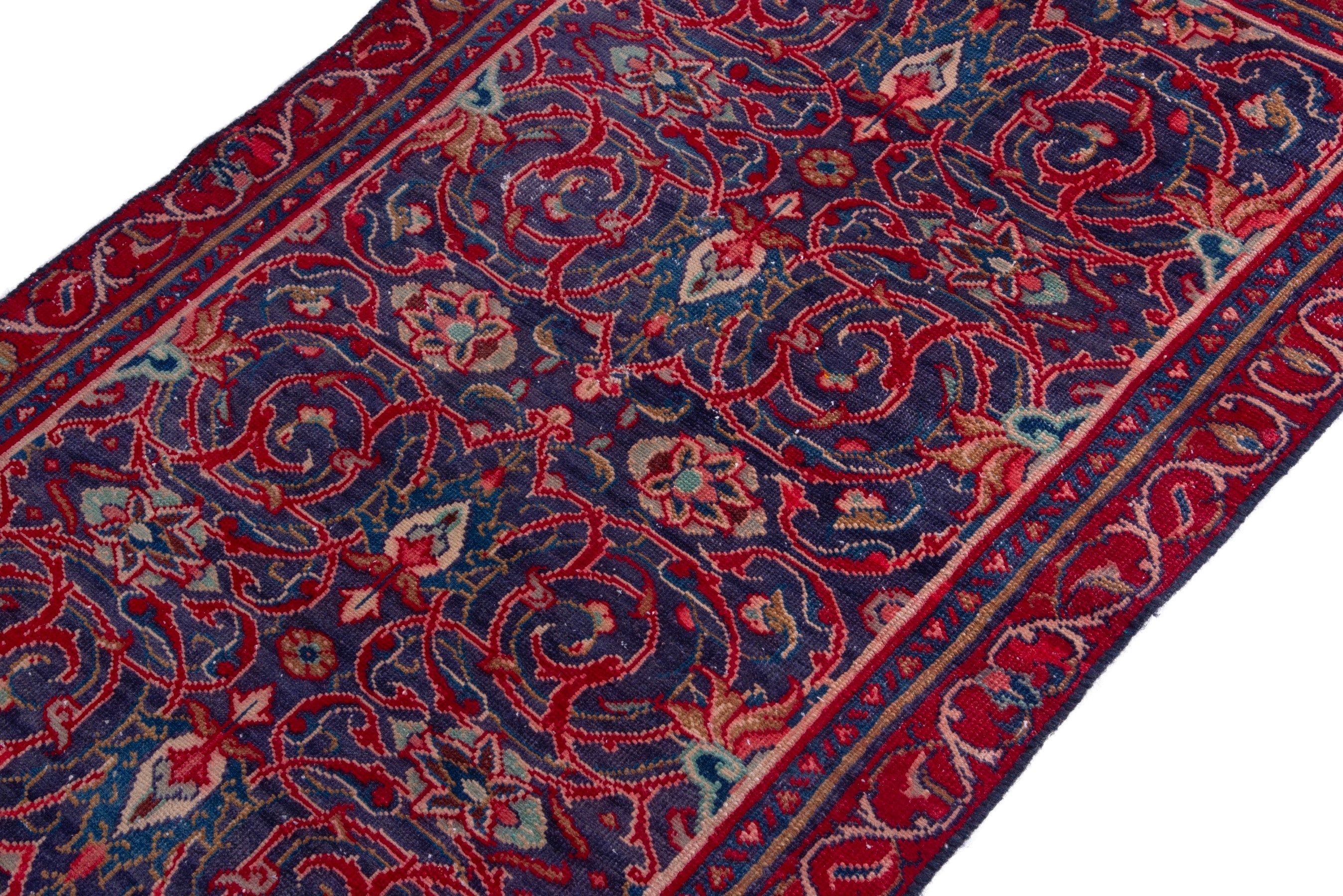 Persian Arak accent rug in deep red and navy, view 6 of 18