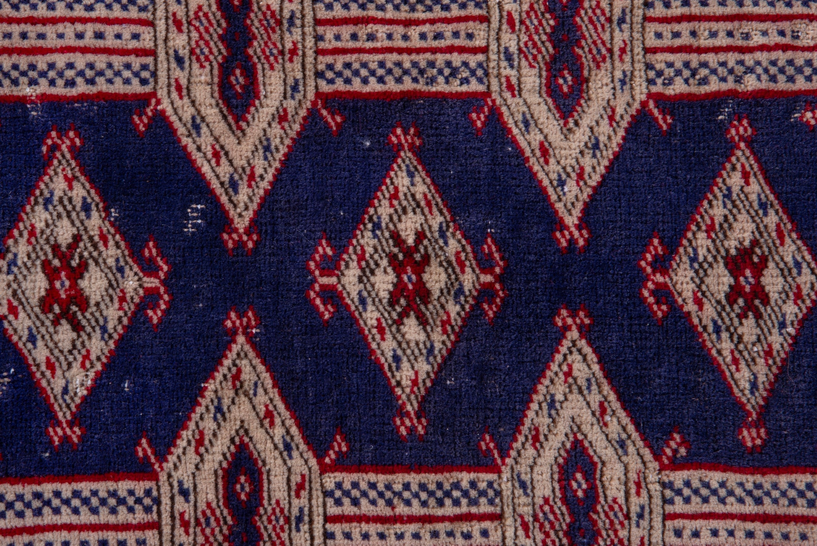 Persian Torkaman accent rug in navy and rose, view 10 of 15
