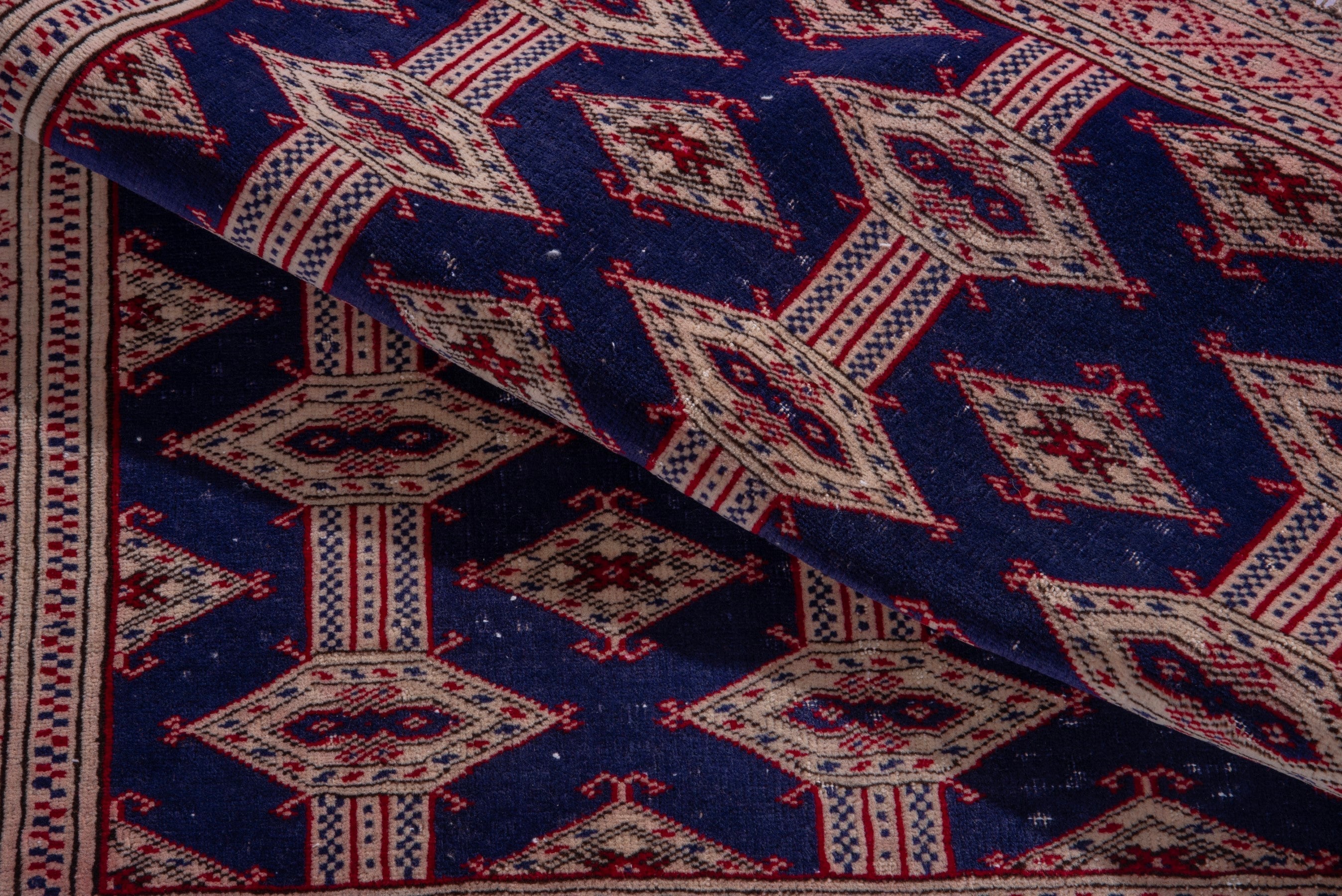 Persian Torkaman accent rug in navy and rose, view 12 of 15