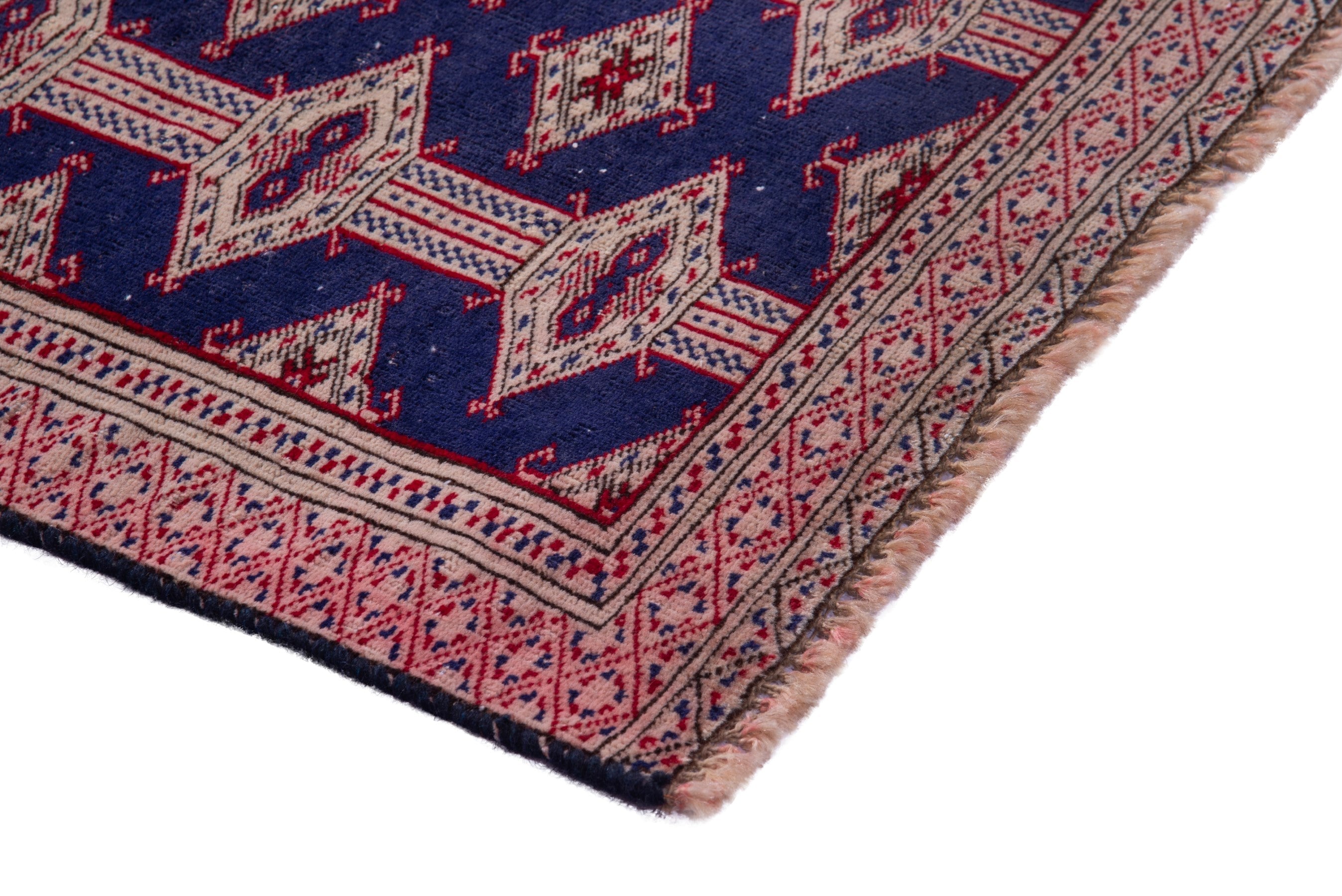 Persian Torkaman accent rug in navy and rose, view 4 of 15