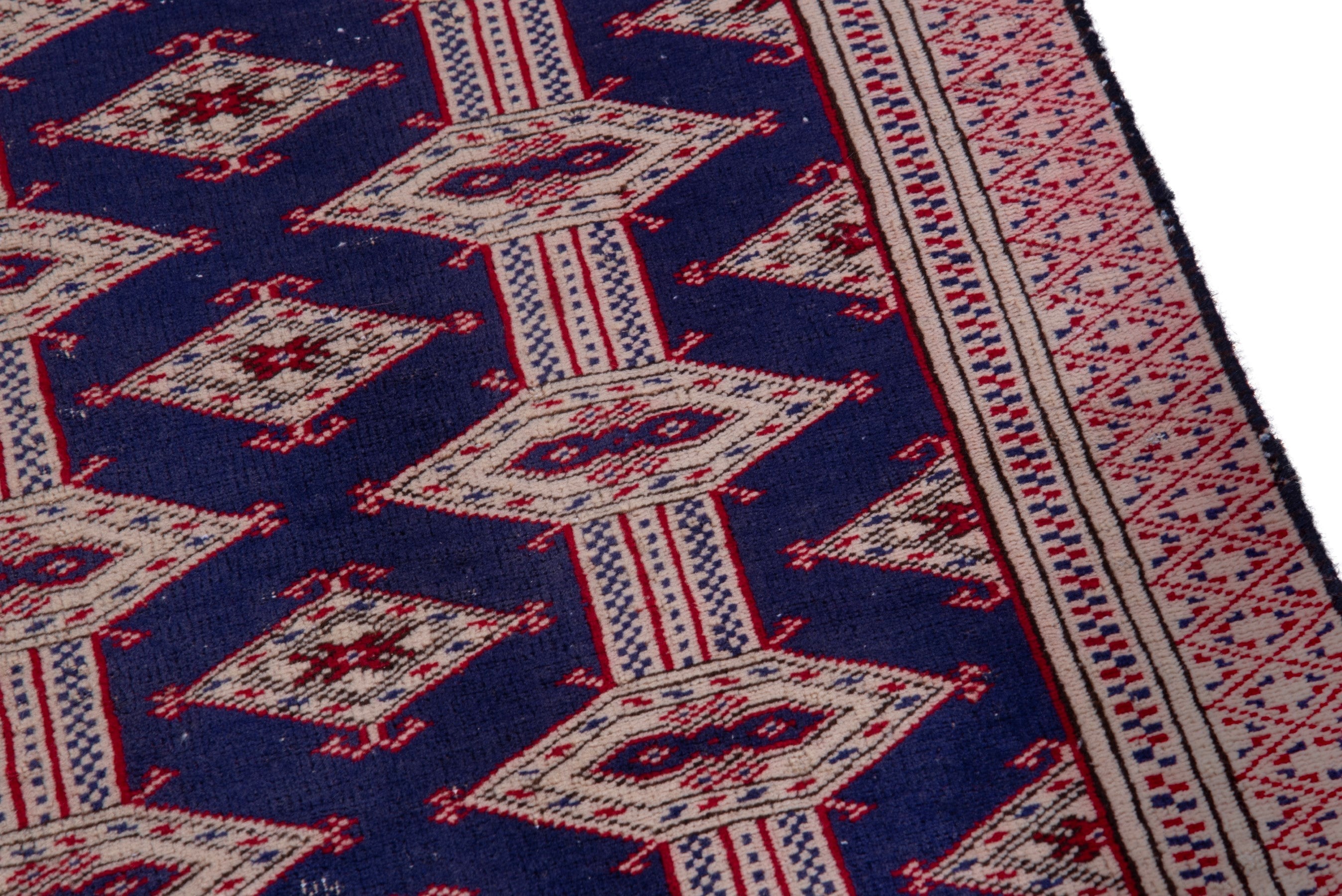 Persian Torkaman accent rug in navy and rose, view 7 of 15