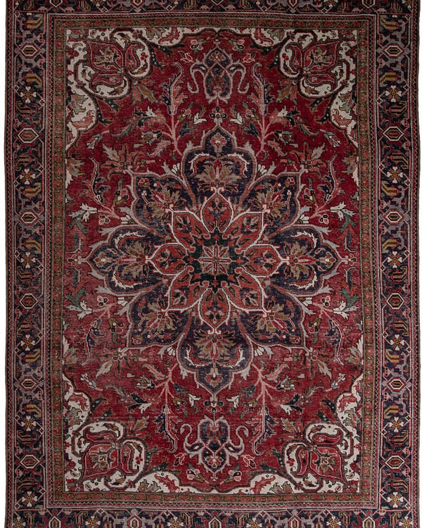 Vintage Persian Goravan rug in madder red