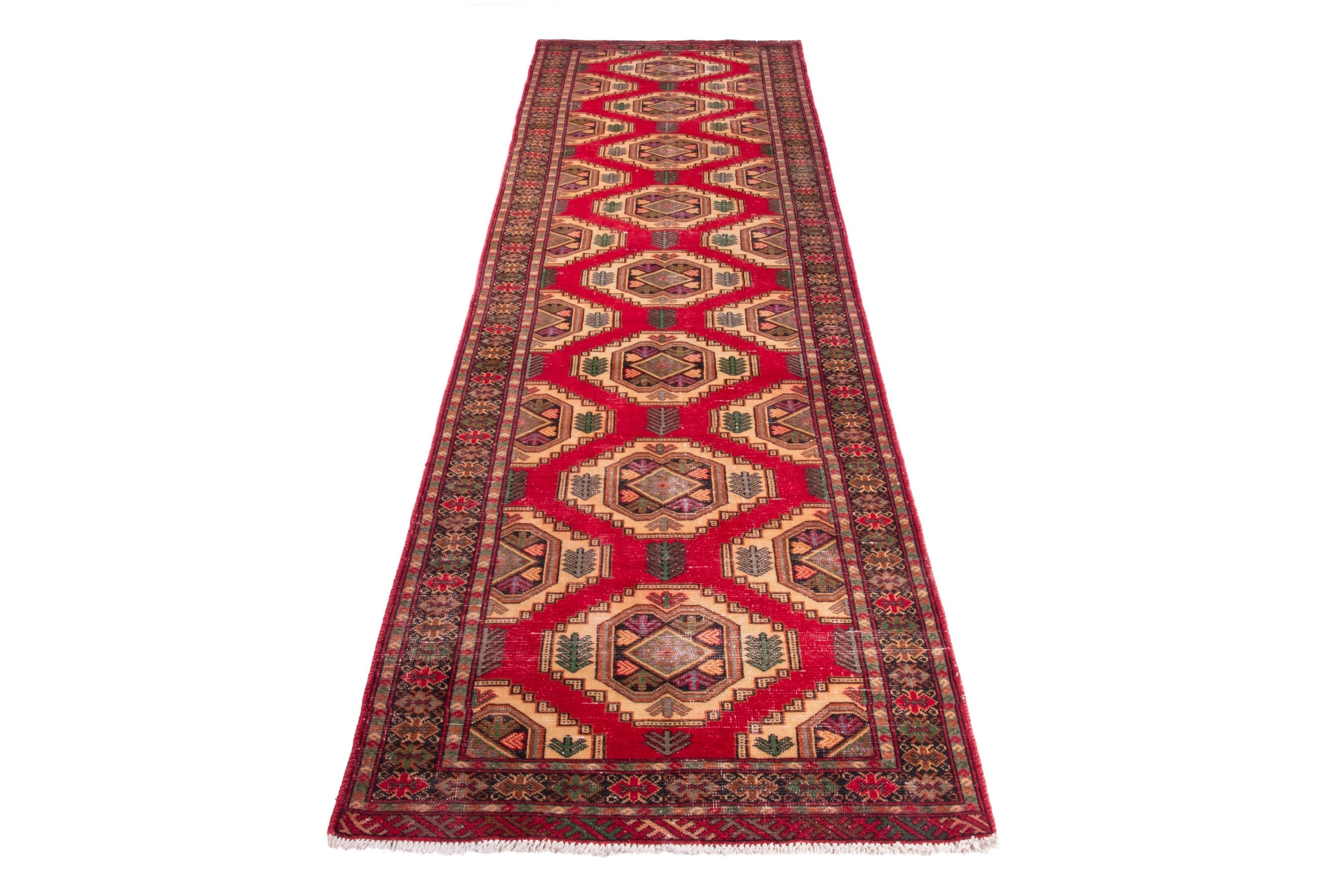 Persian Torkaman runner rug in deep red and cream, view 2 of 17