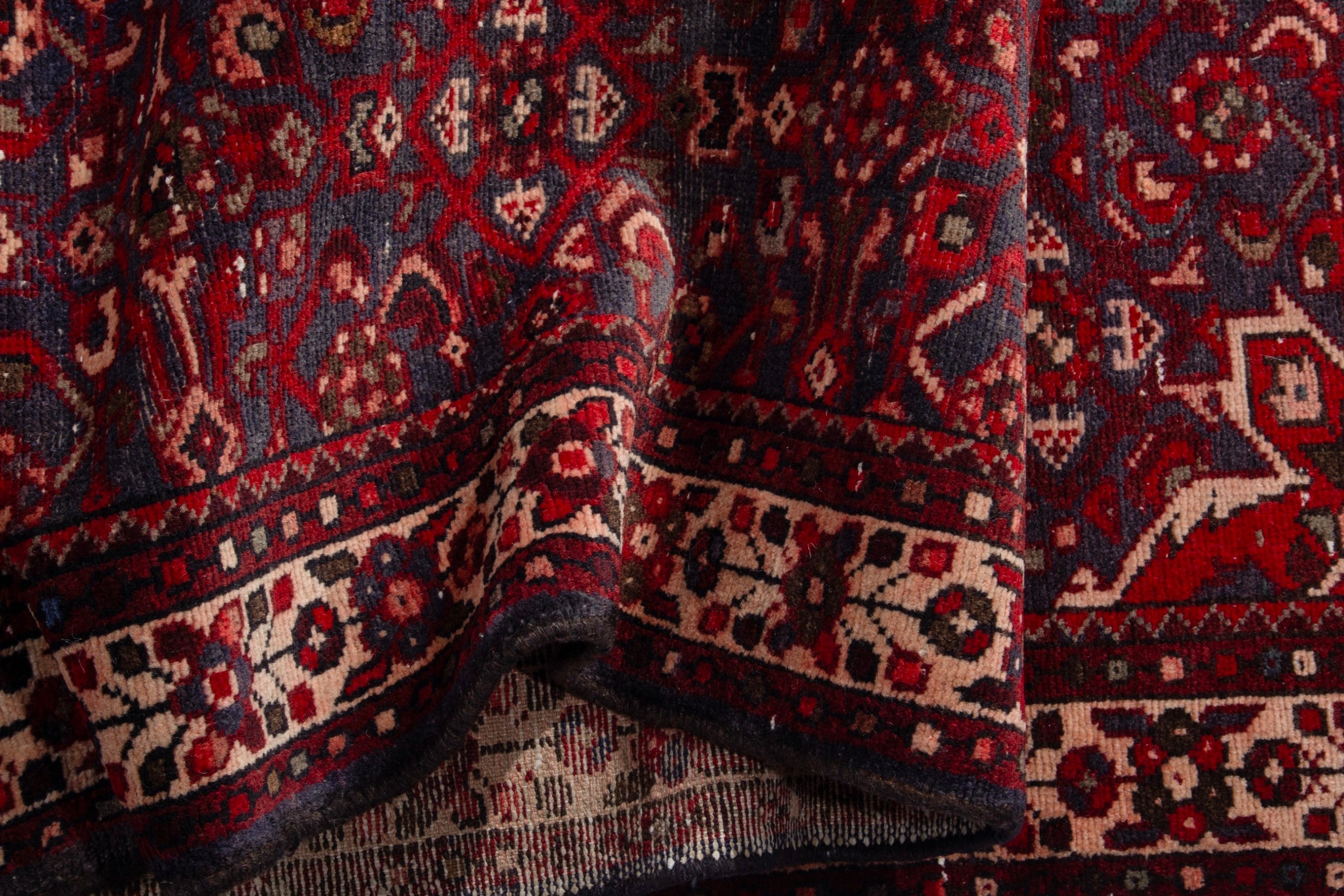 Persian runner rug in deep red and charcoal, view 14 of 17