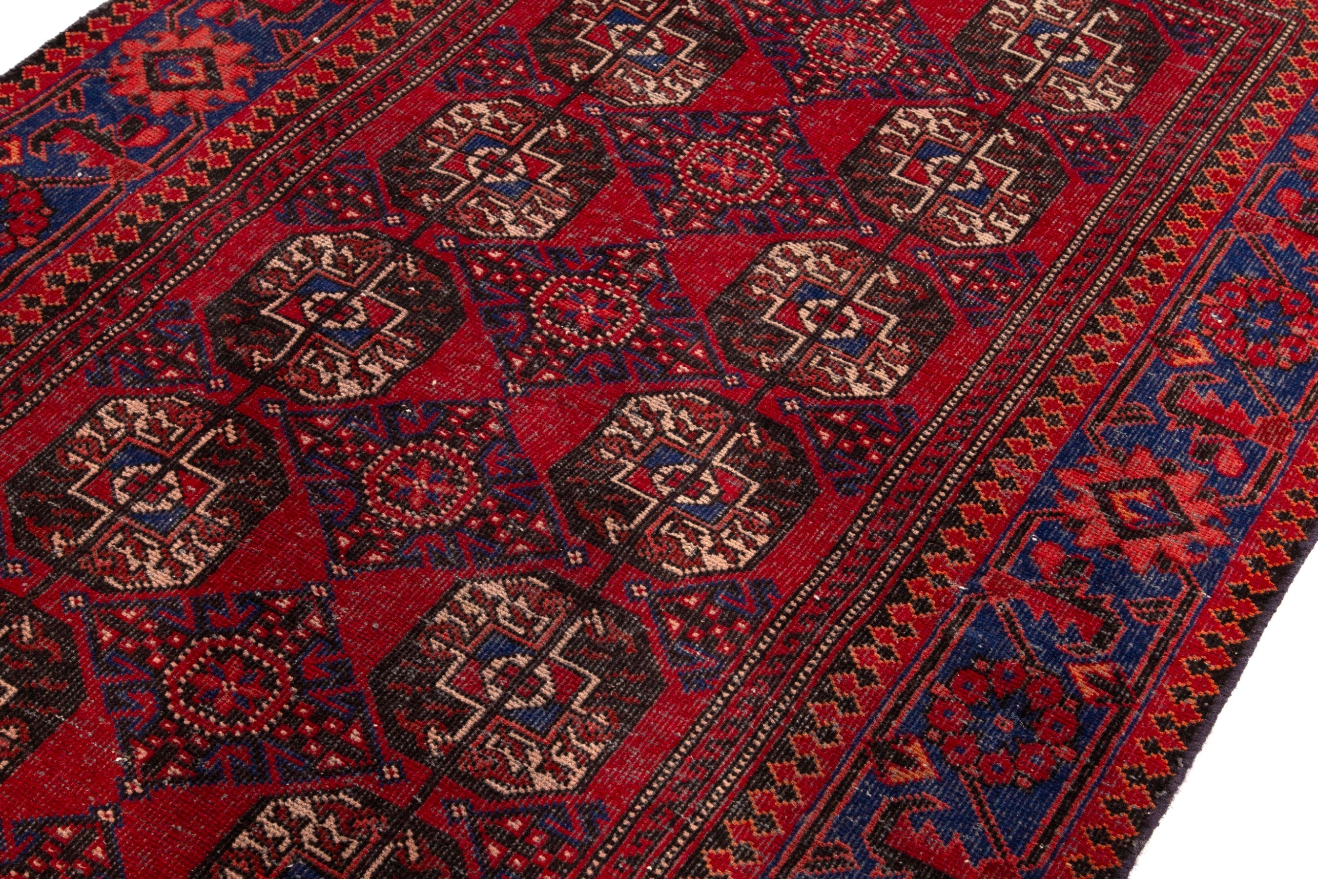 Persian Ferdos runner rug in deep red and navy, view 6 of 18