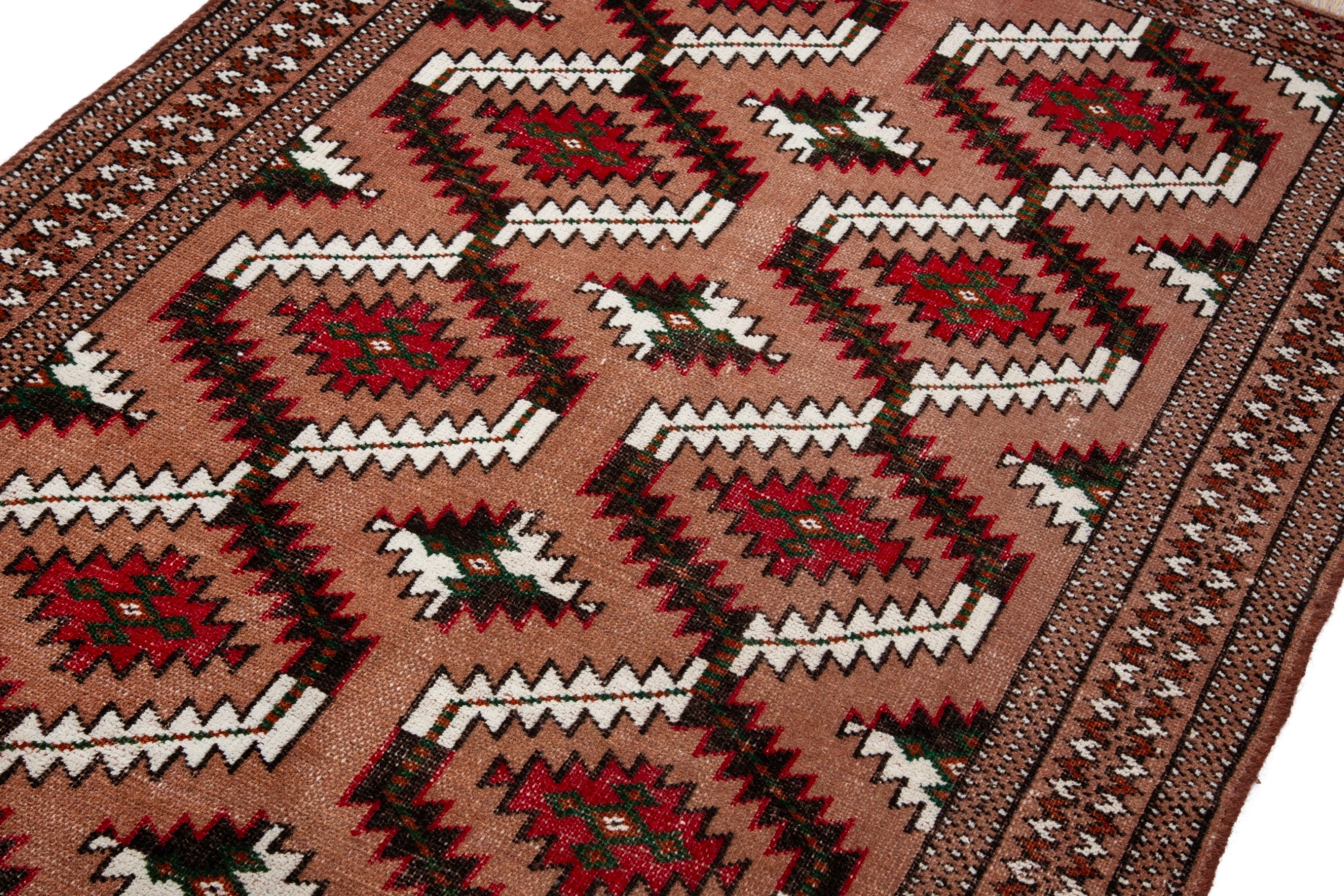 Persian Torkaman accent rug in terracotta and rust, view 6 of 16