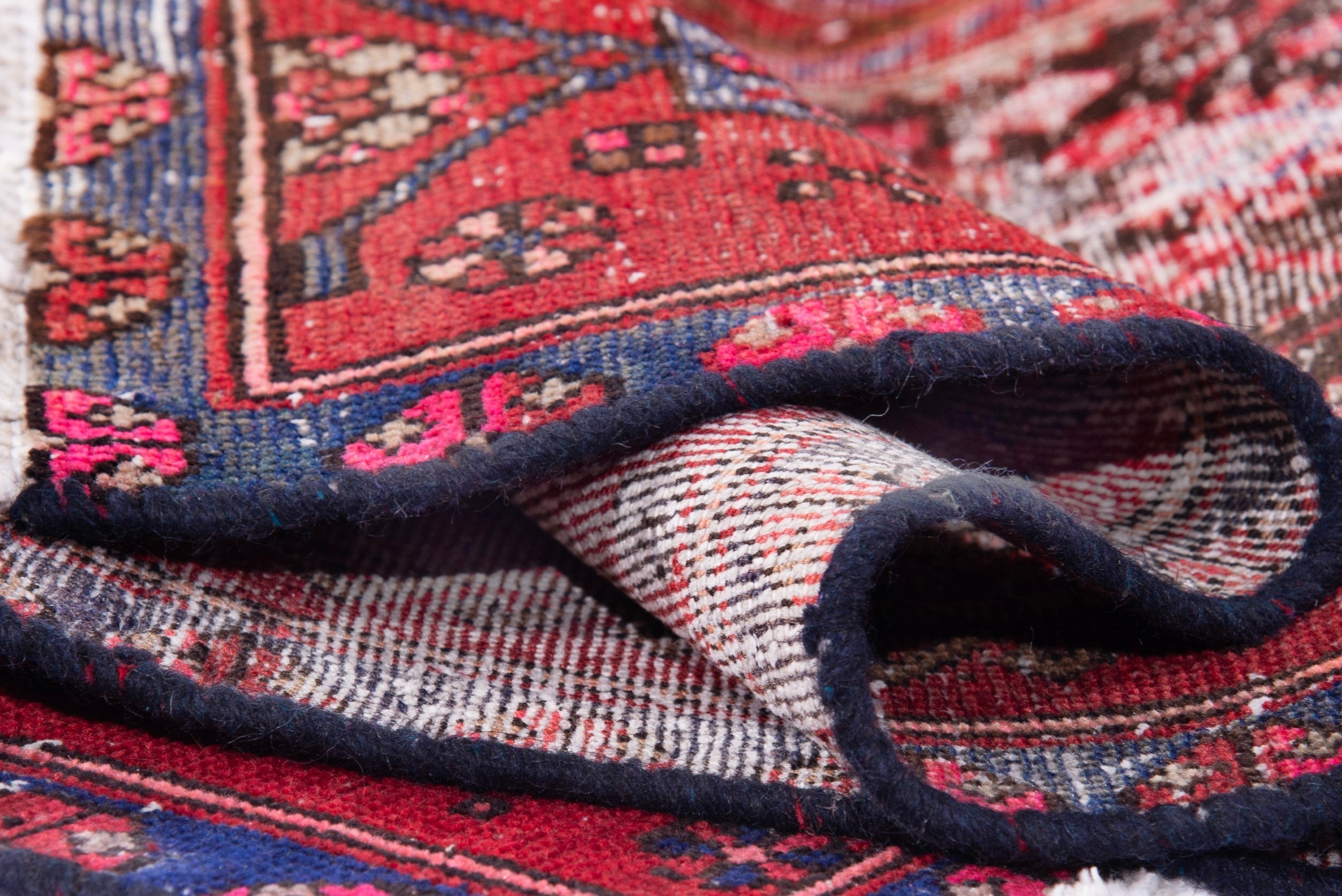 Persian Zanjan accent rug in deep red and faded red, view 14 of 15