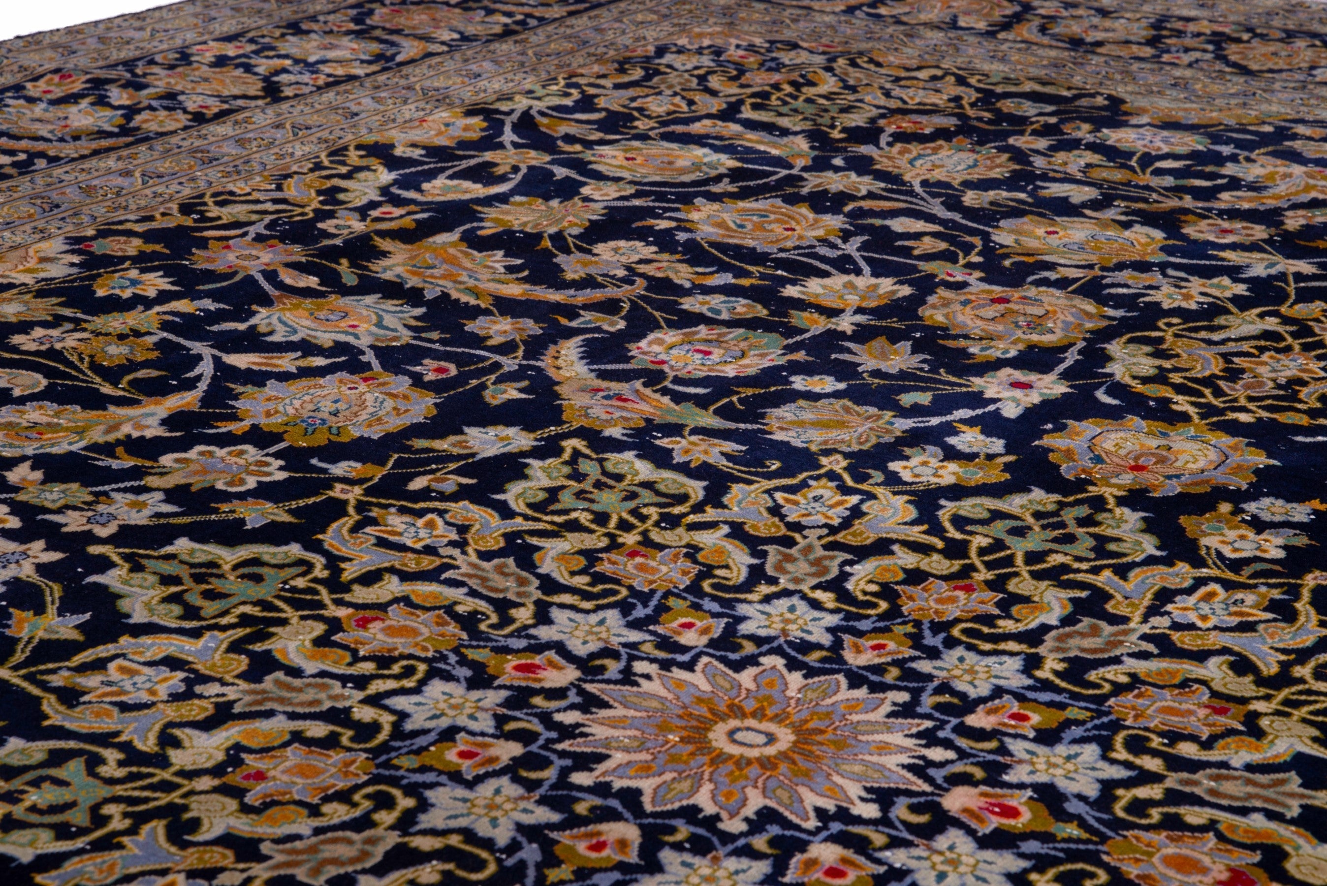 Persian Kashan oversized rug in navy and antique gold, view 14 of 22