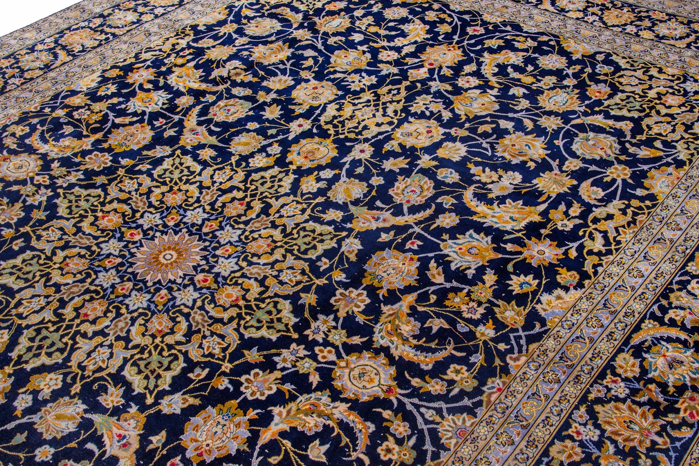 Persian Kashan oversized rug in navy and antique gold, view 6 of 22