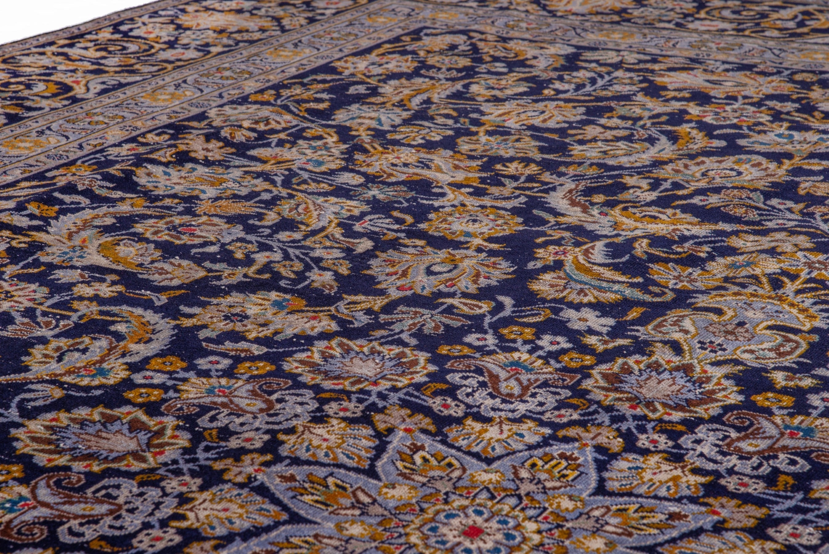 Persian Kashan oversized rug in navy and gold, view 14 of 21