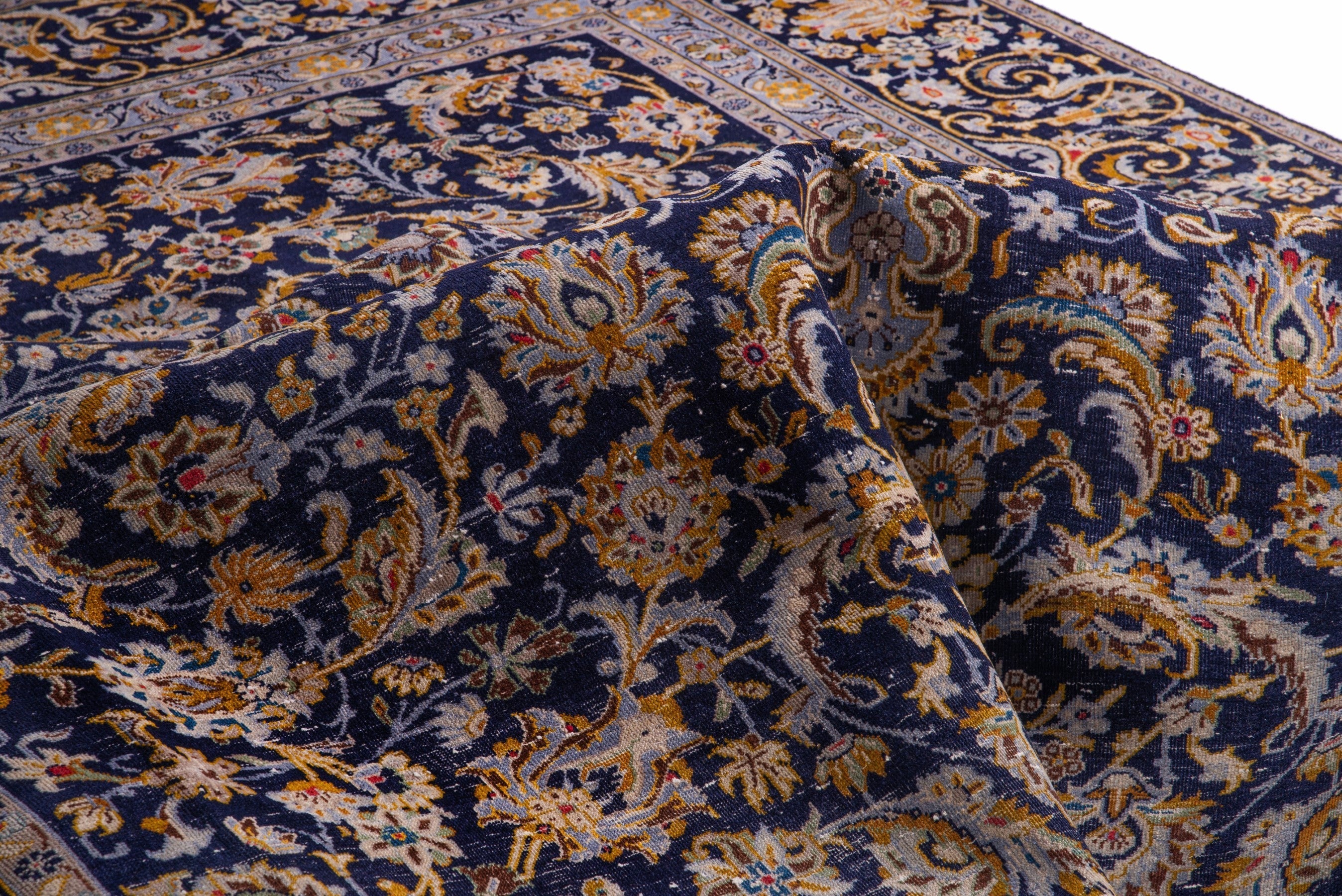 Persian Kashan oversized rug in navy and gold, view 15 of 21