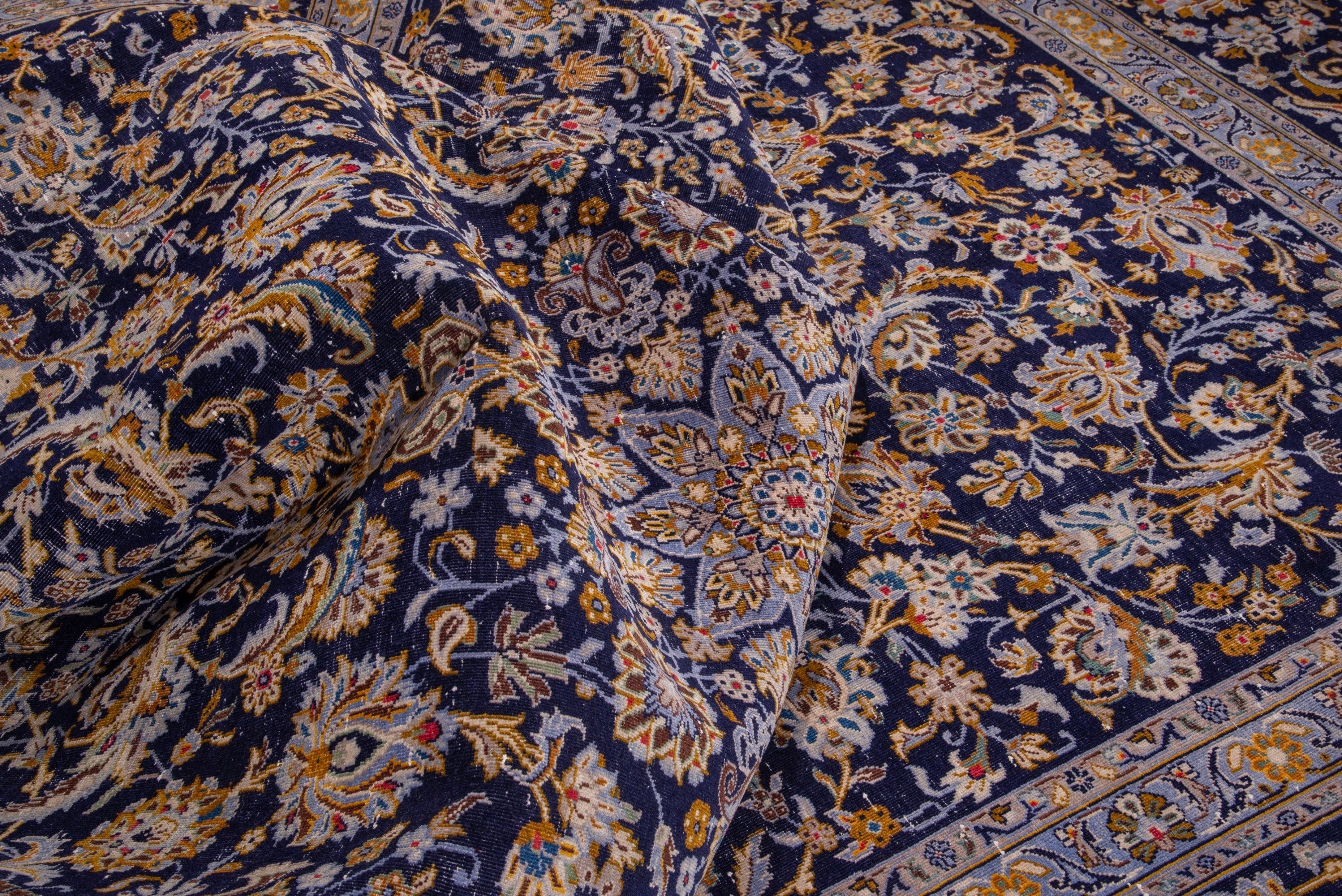 Persian Kashan oversized rug in navy and gold, view 17 of 21