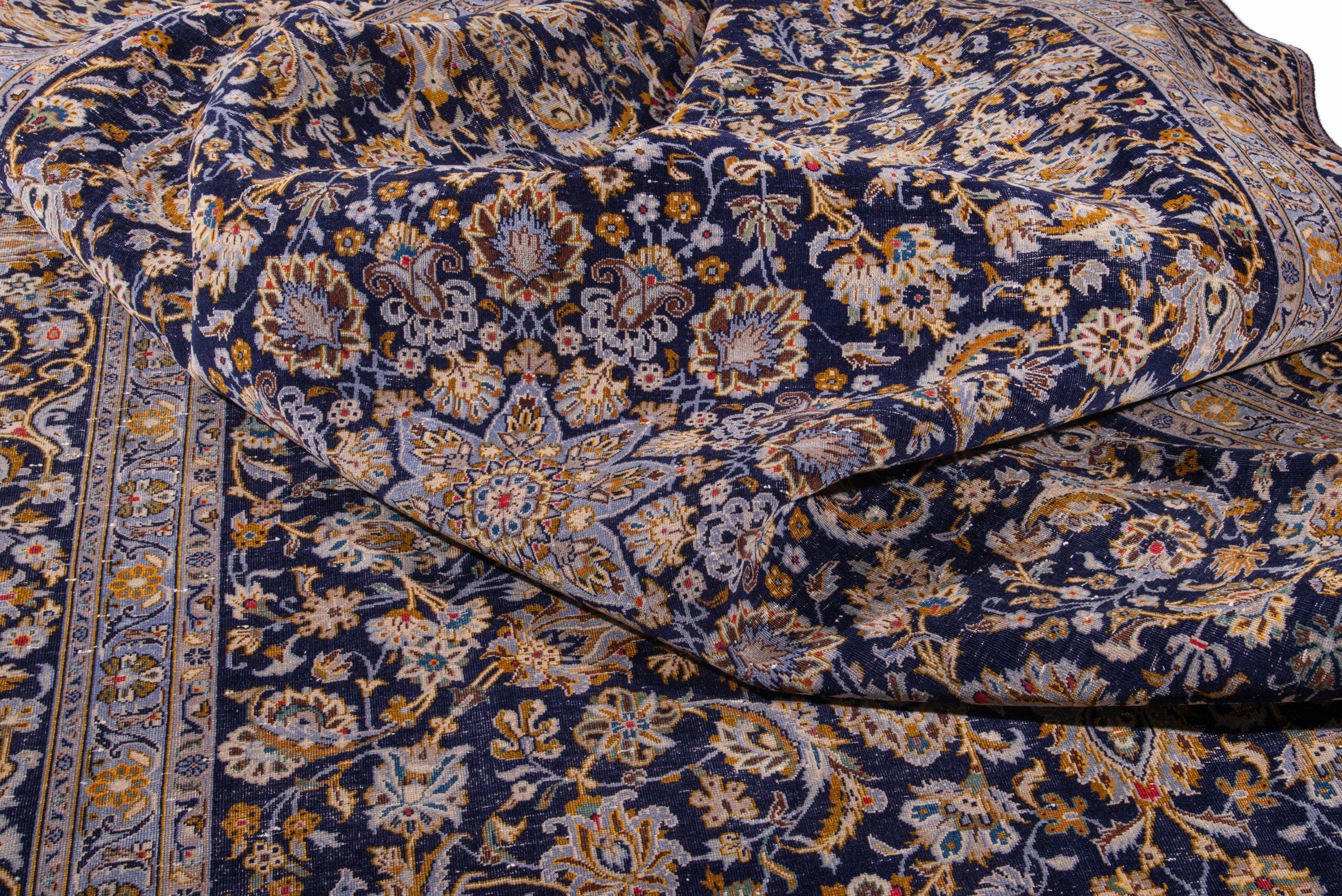 Persian Kashan oversized rug in navy and gold, view 18 of 21