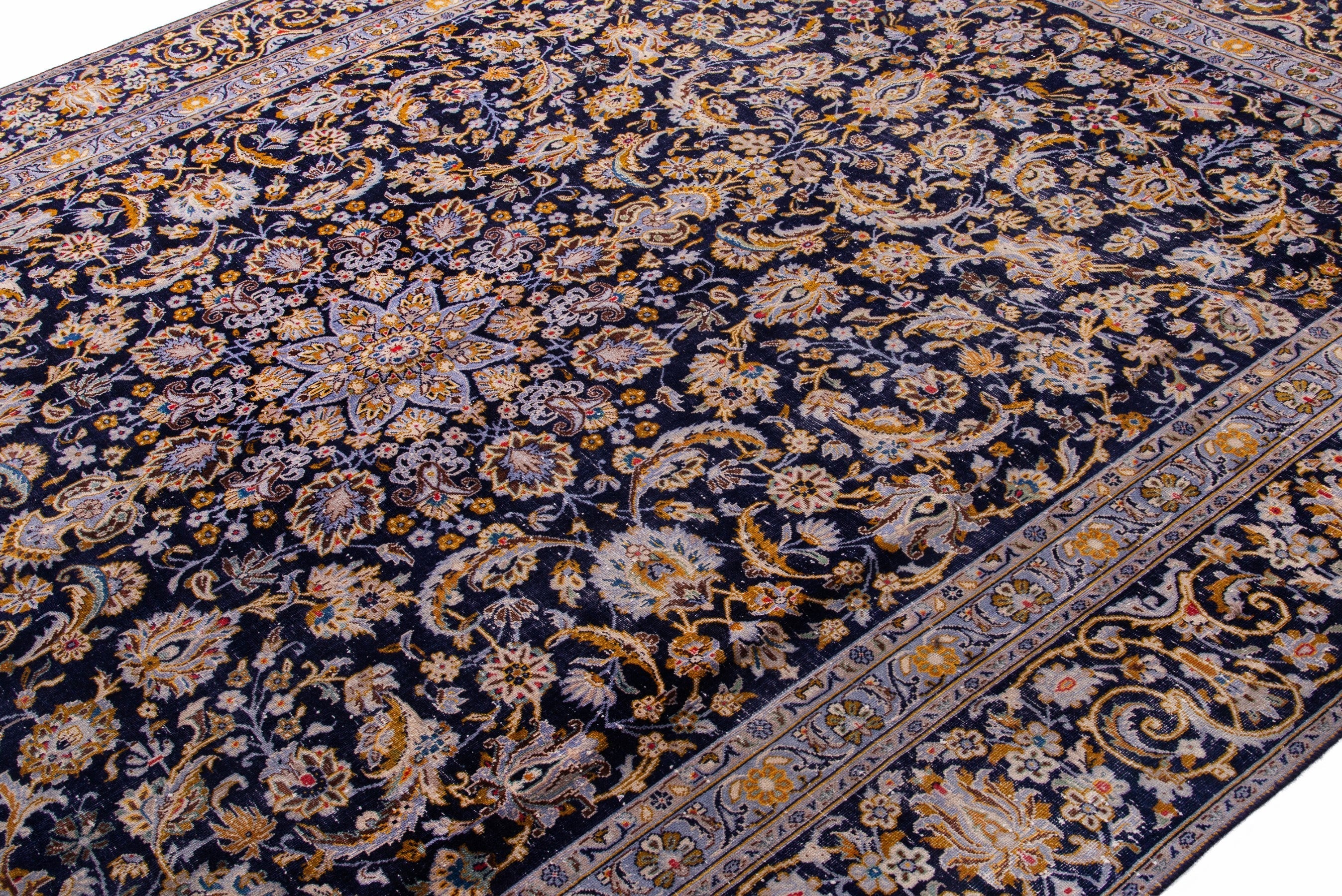 Persian Kashan oversized rug in navy and gold, view 6 of 21