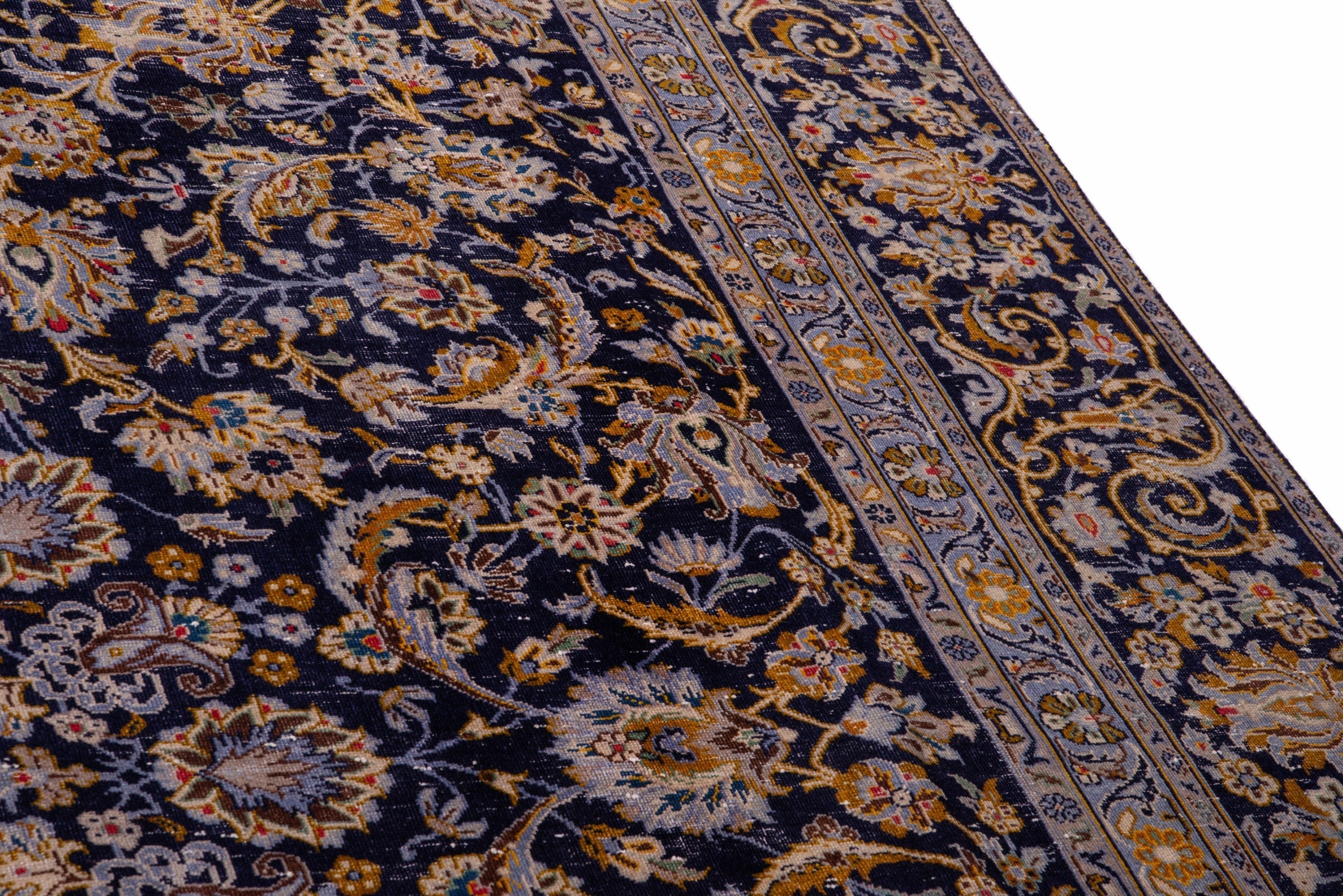 Persian Kashan oversized rug in navy and gold, view 7 of 21