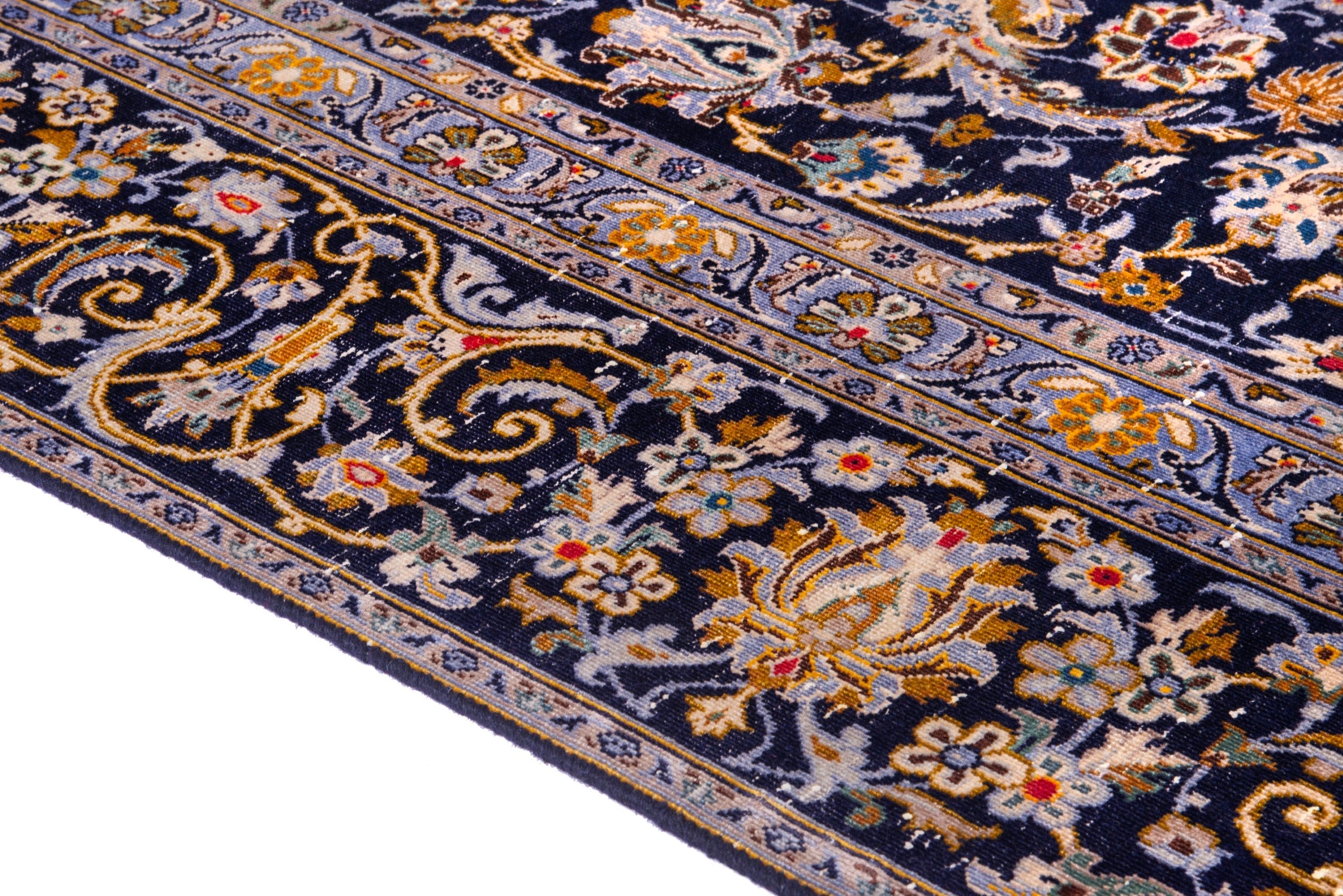 Persian Kashan oversized rug in navy and gold, view 8 of 21