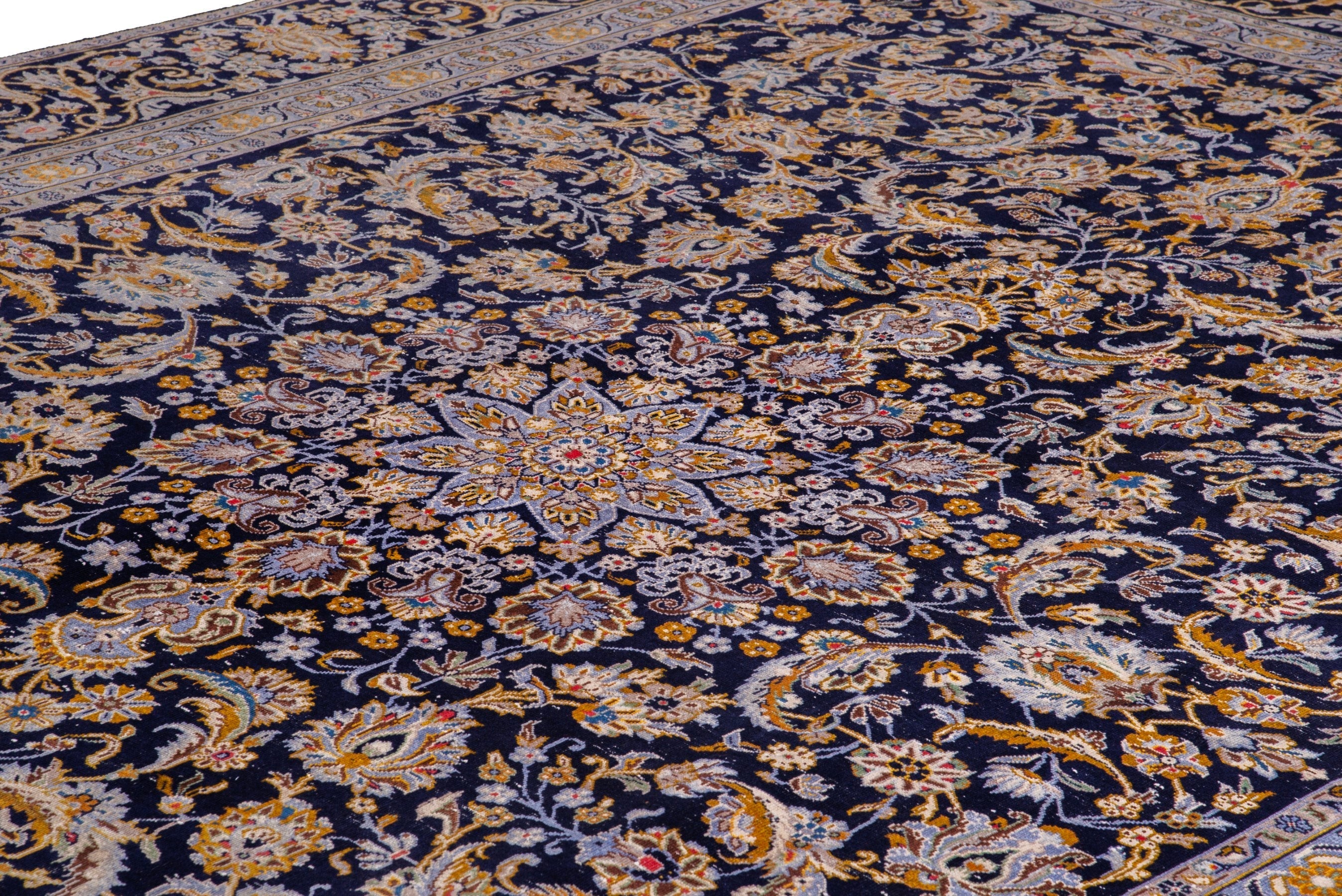 Persian Kashan oversized rug in navy and gold, view 9 of 21