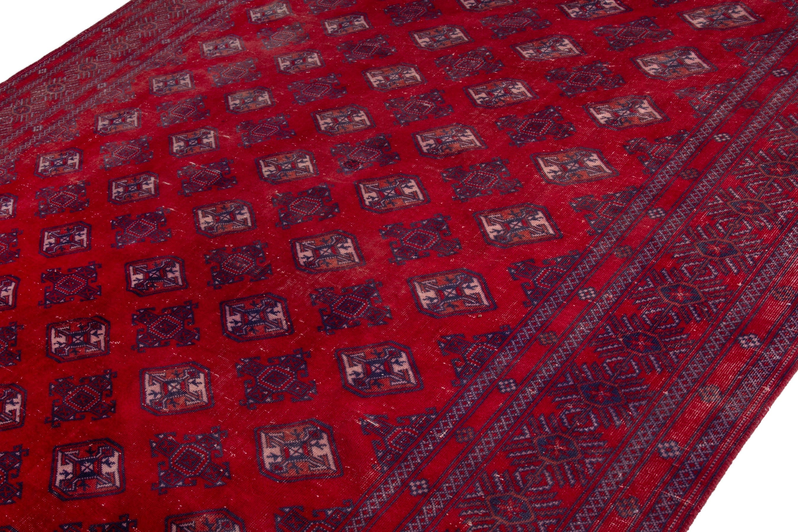 Persian Torkaman oversized rug in deep red and burgundy, view 6 of 21
