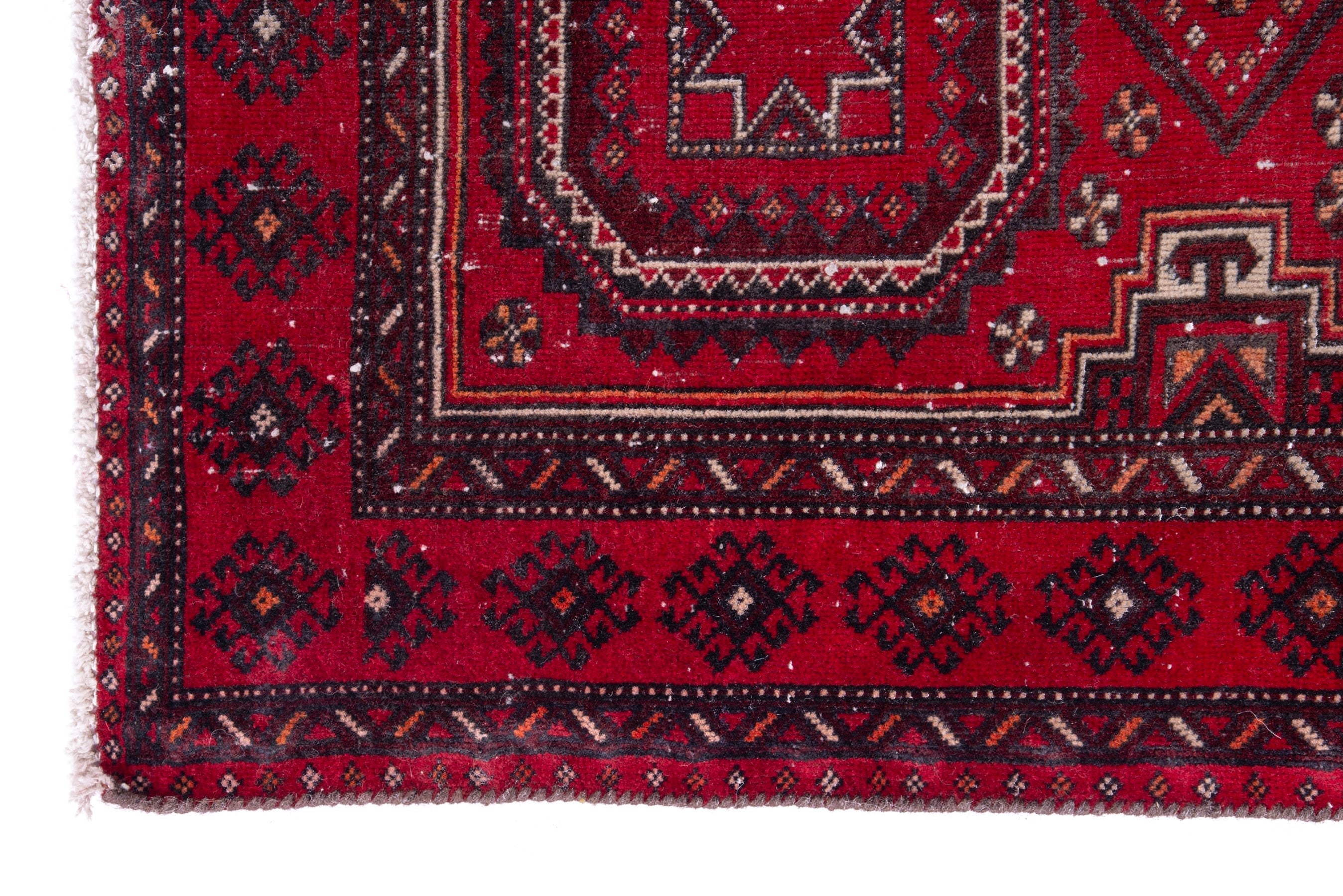 Persian Baluch accent rug in deep red and burgundy, view 5 of 16