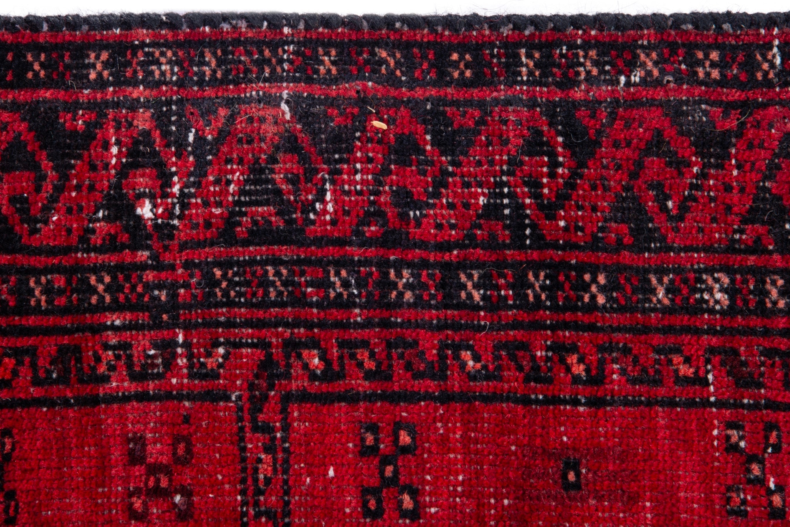 Persian Baluch accent rug in deep red and faded red, view 11 of 15