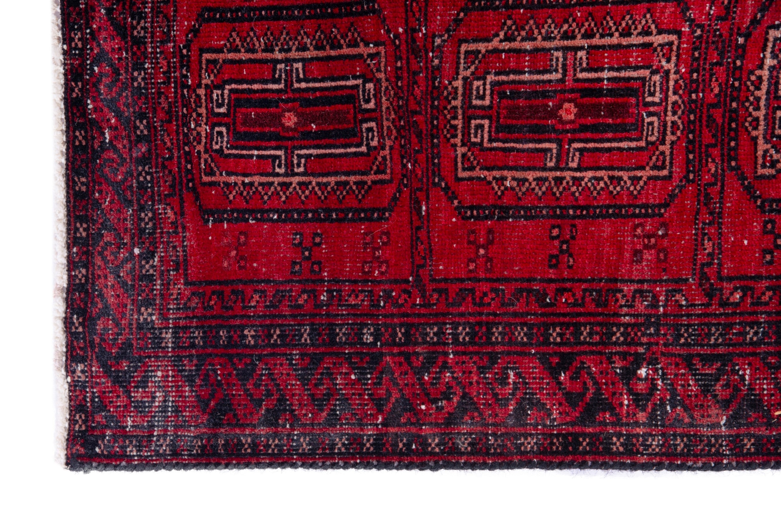 Persian Baluch accent rug in deep red and faded red, view 5 of 15