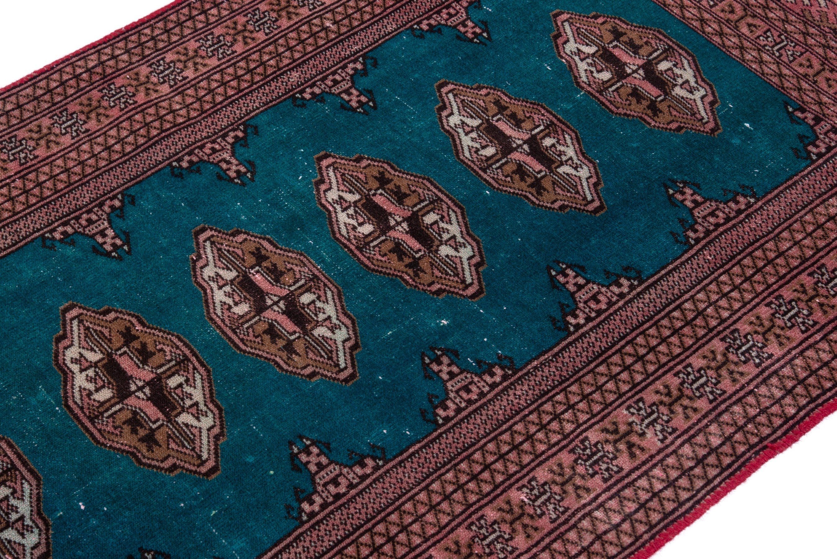 Persian Torkaman accent rug in teal and rust, view 4 of 16