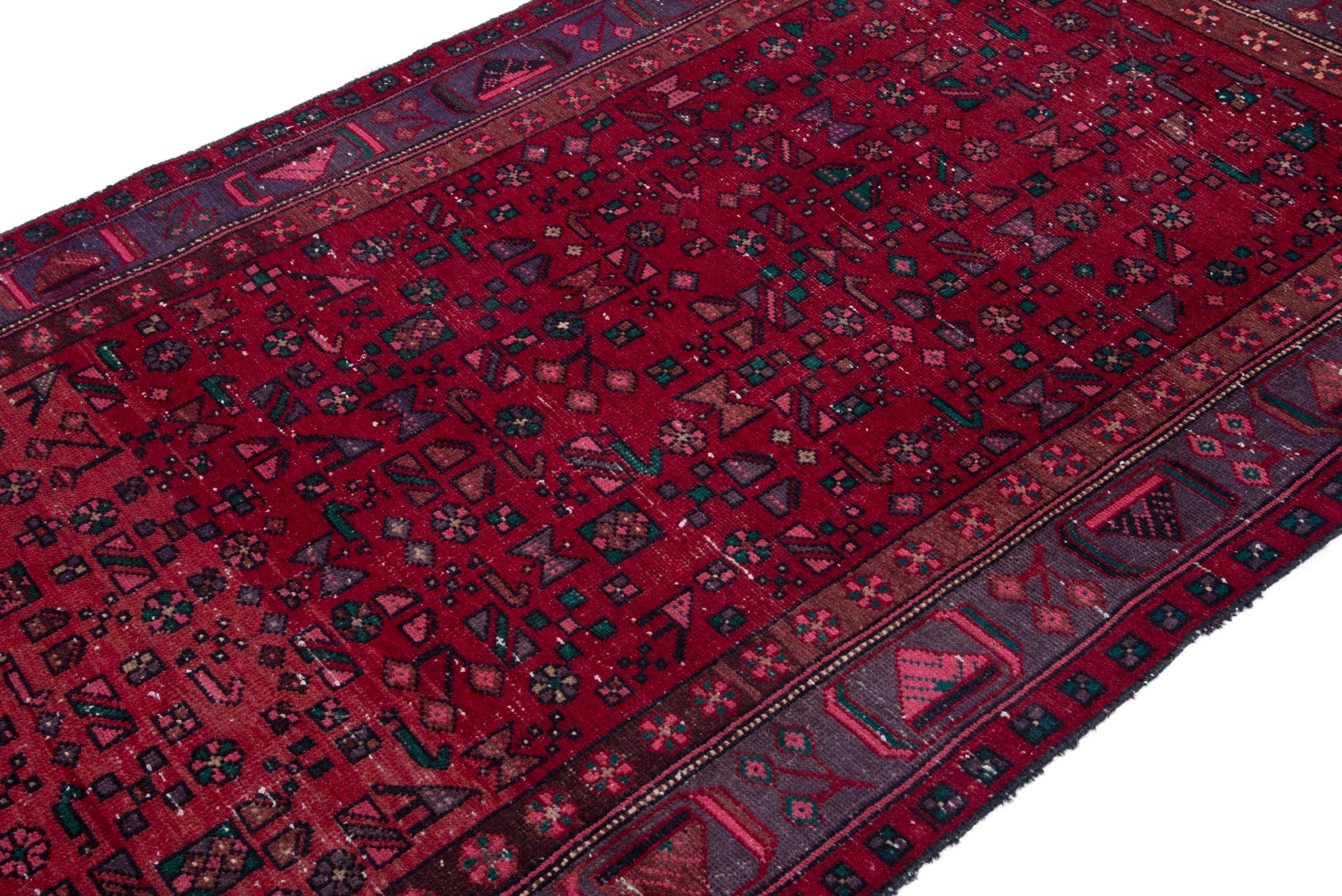 Persian area rug in deep red and navy, view 6 of 18