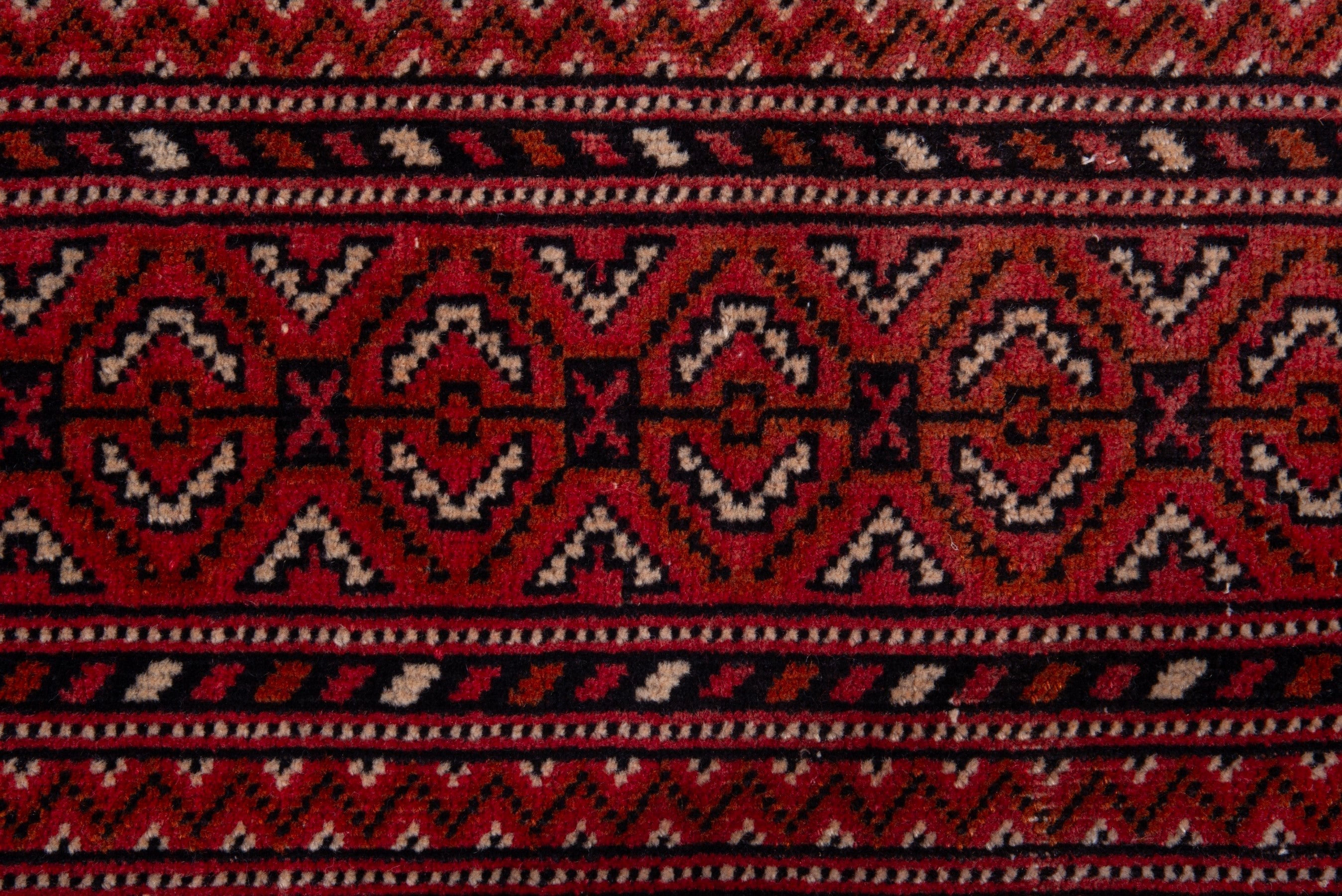Persian Torkaman runner rug in deep red and cream, view 12 of 17