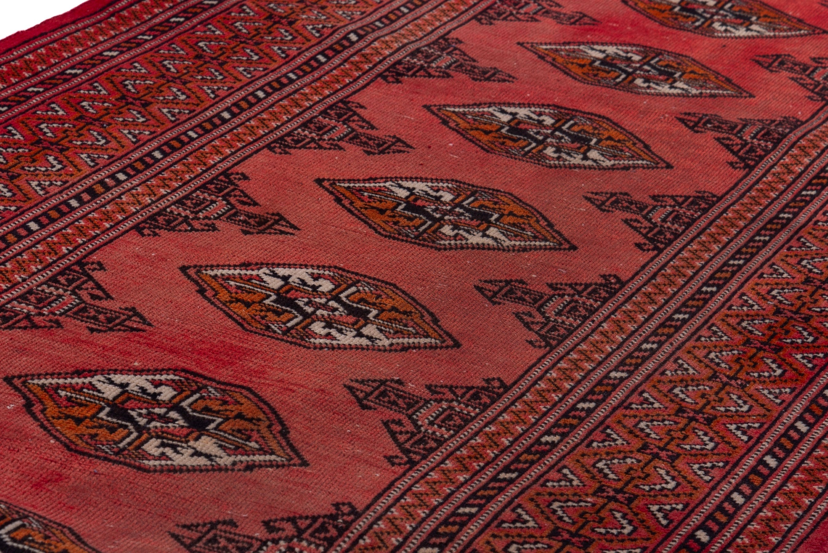 Persian Torkaman runner rug in deep red and cream, view 13 of 17