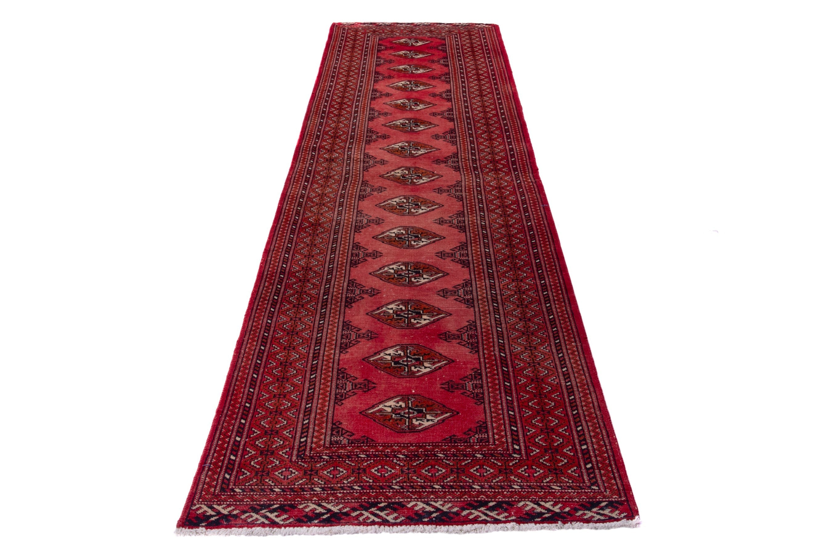 Persian Torkaman runner rug in deep red and cream, view 2 of 17