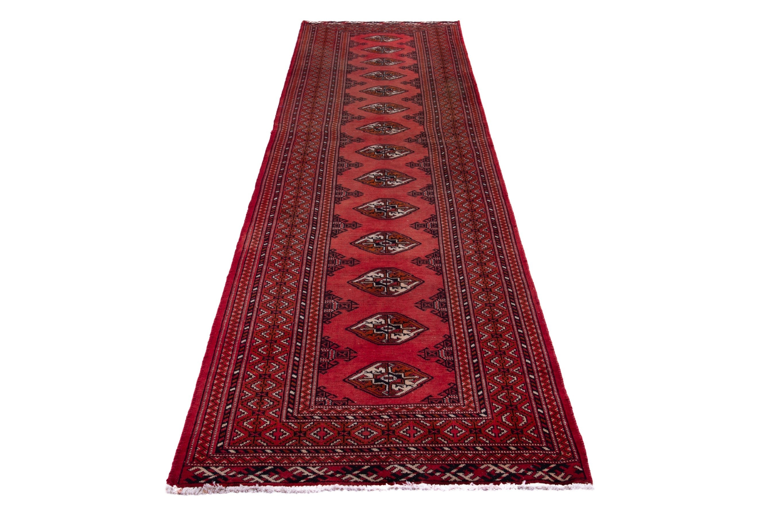 Persian Torkaman runner rug in deep red and cream, view 3 of 17