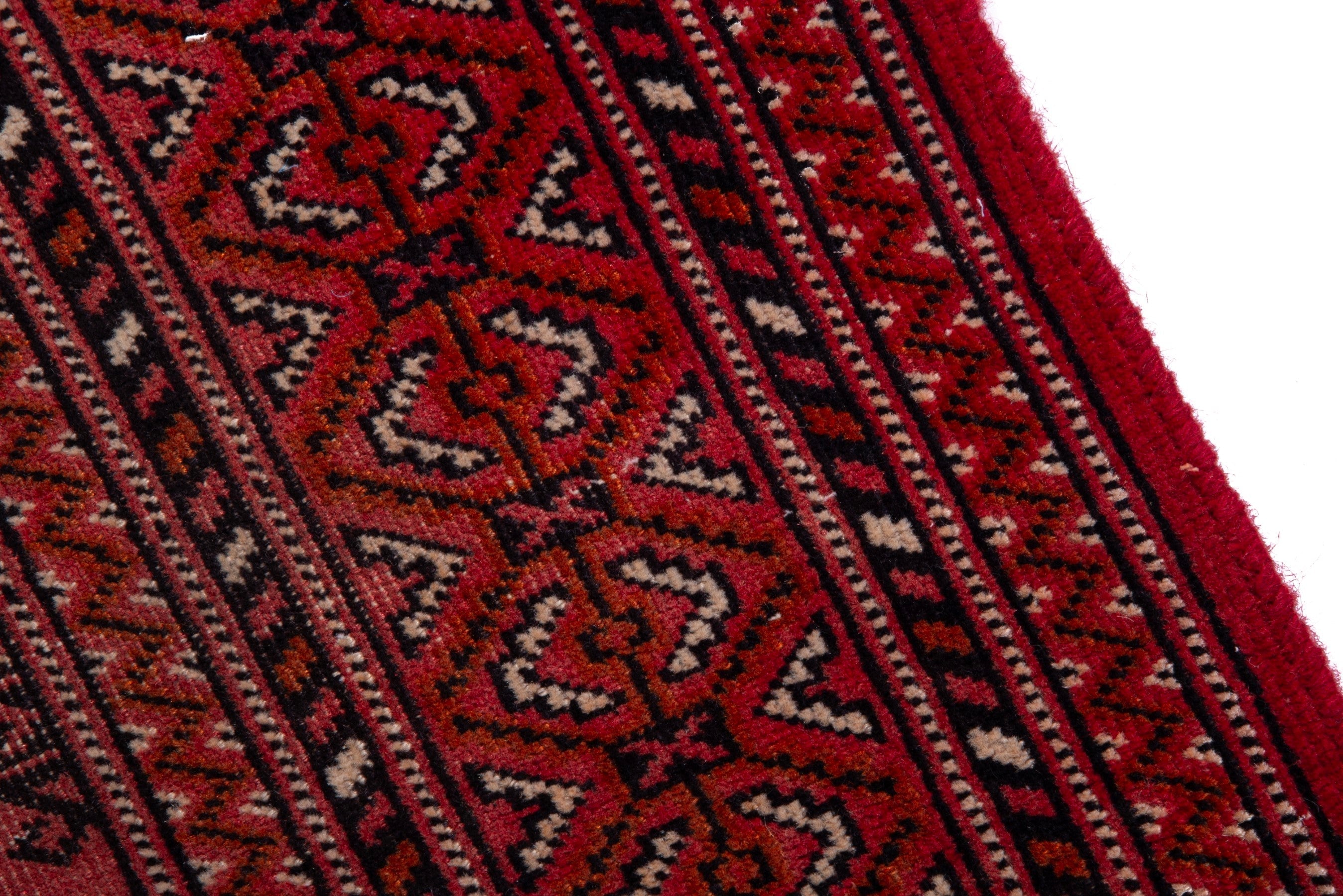 Persian Torkaman runner rug in deep red and cream, view 7 of 17