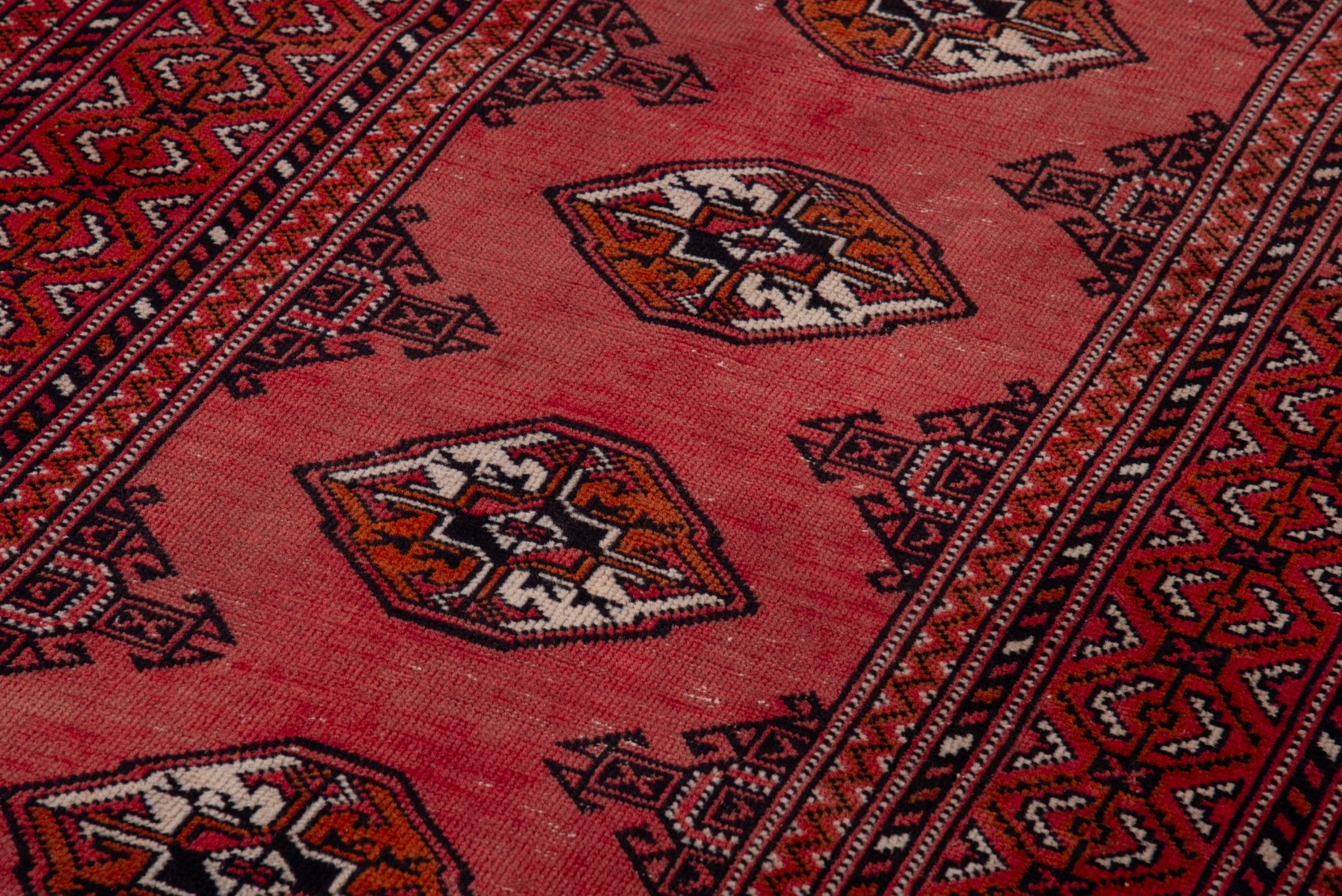 Persian Torkaman runner rug in deep red and cream, view 9 of 17