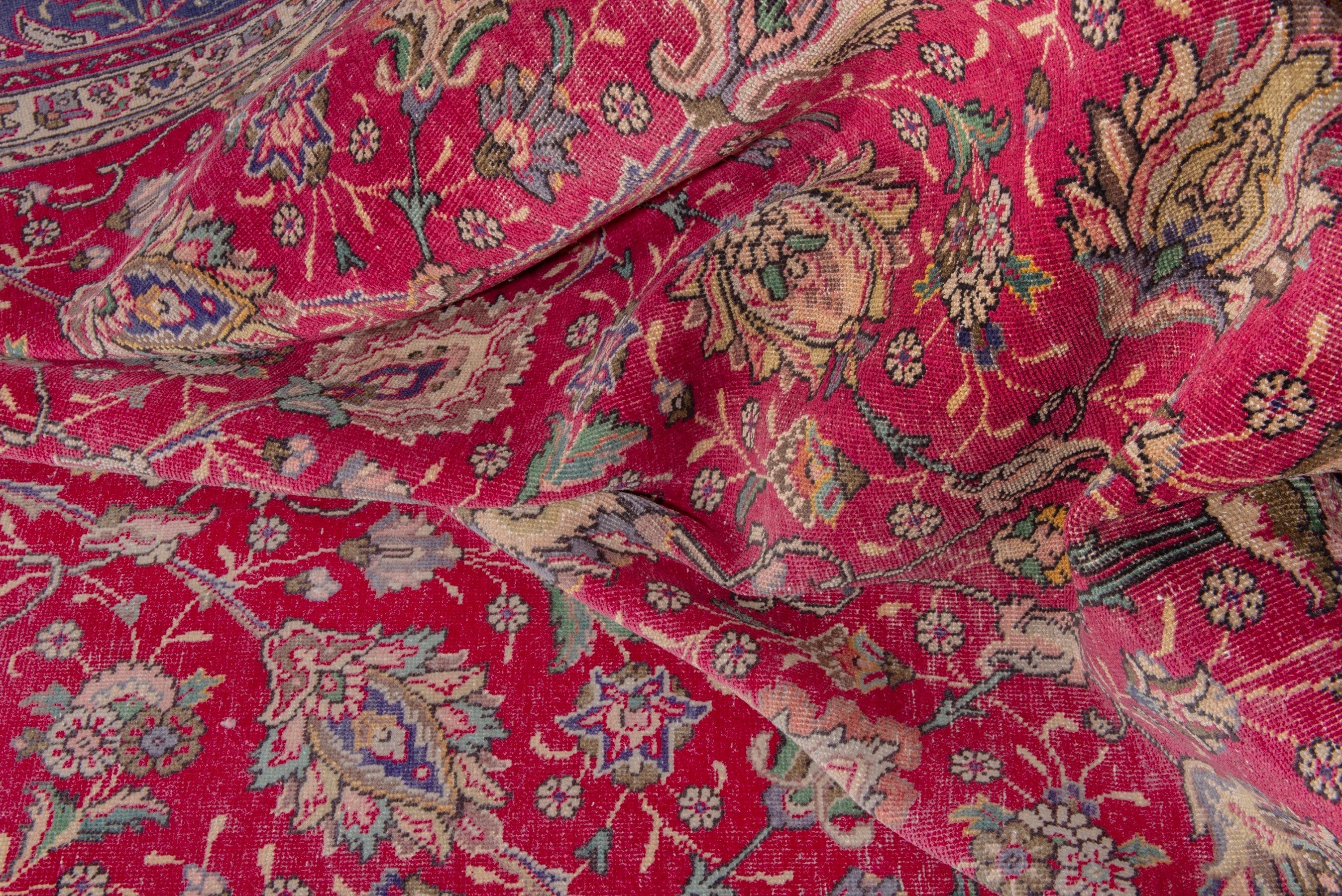 Persian Tabriz oversized rug in deep red and dark blue, view 15 of 17