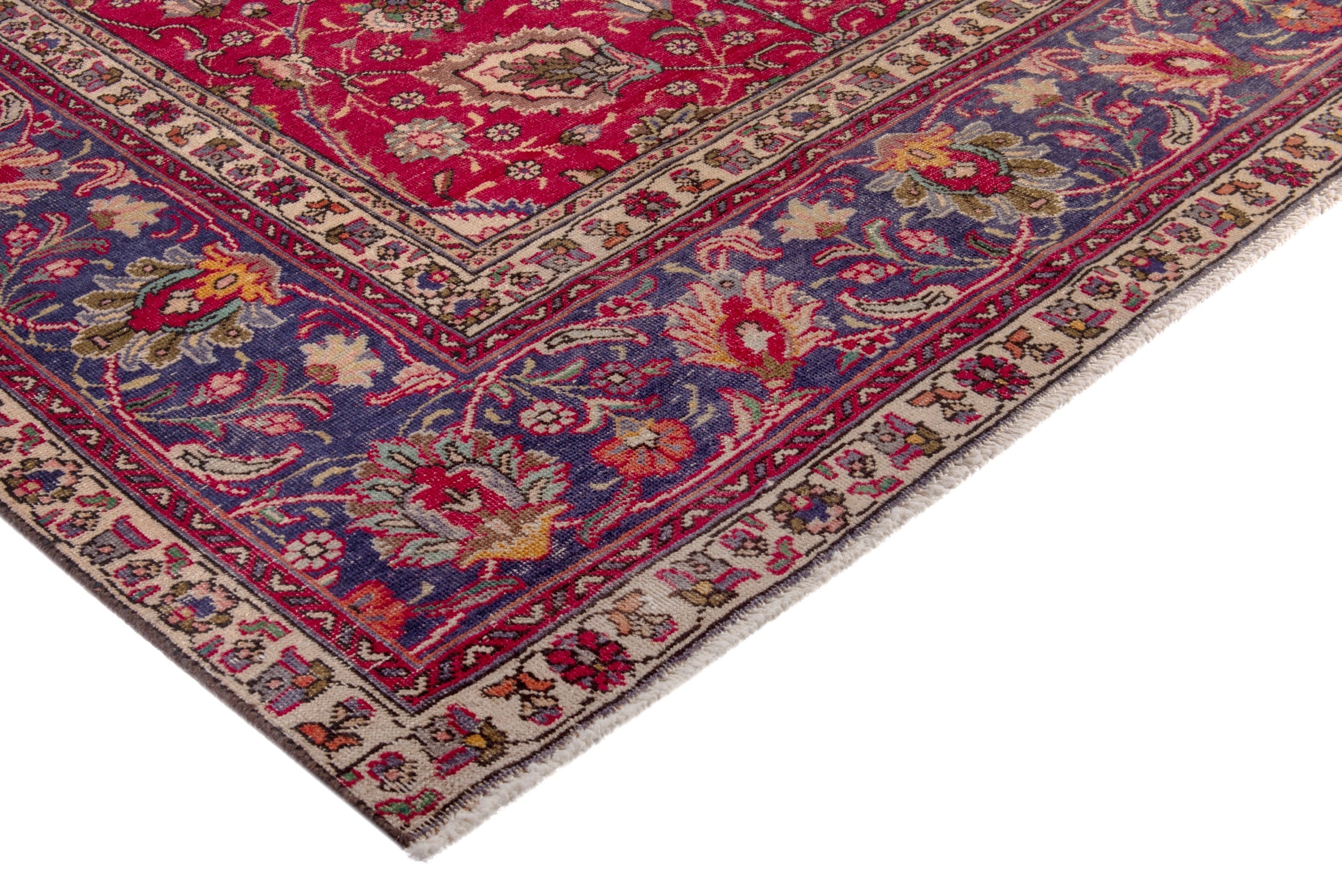 Persian Tabriz oversized rug in deep red and dark blue, view 4 of 17