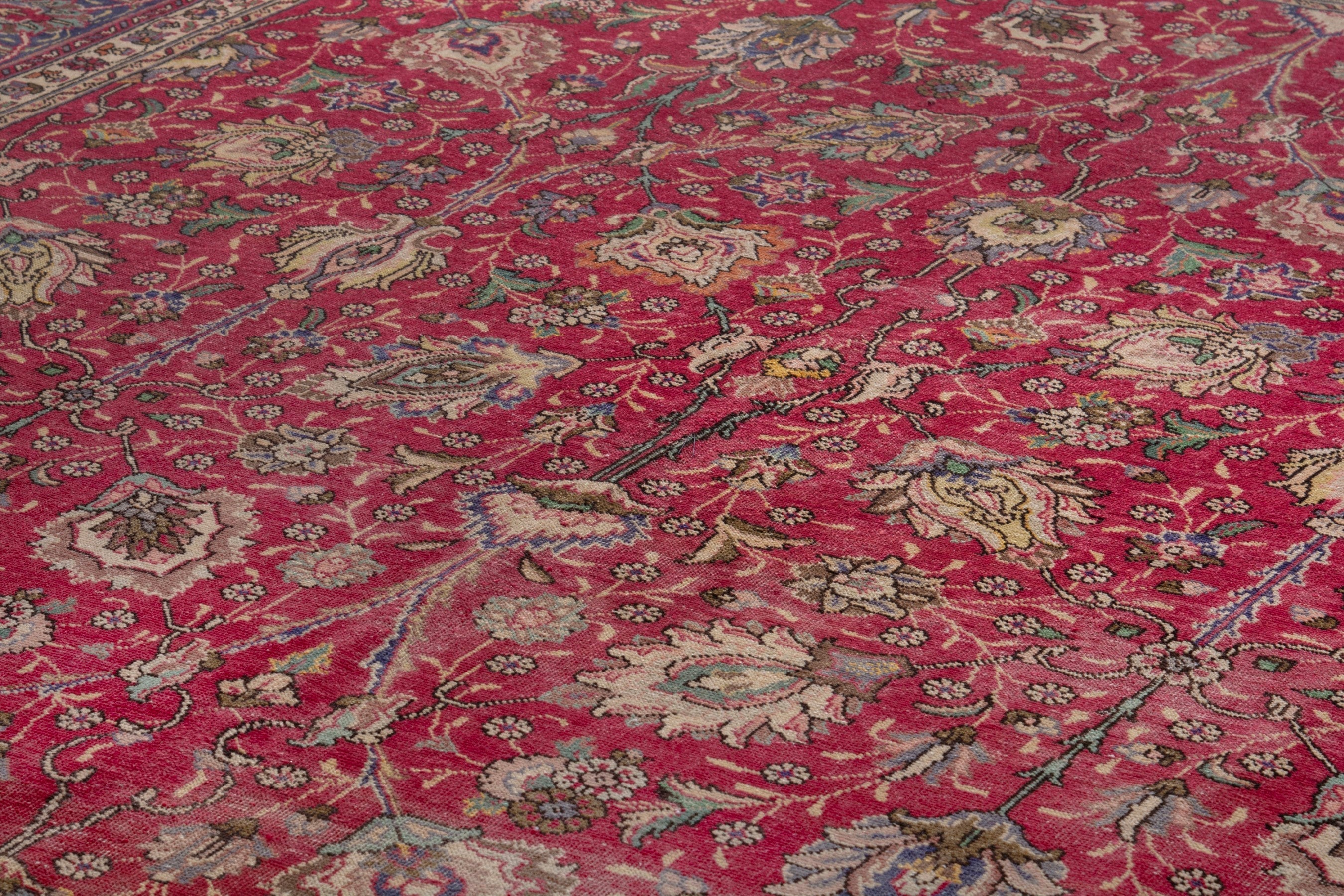 Persian Tabriz oversized rug in deep red and dark blue, view 9 of 17