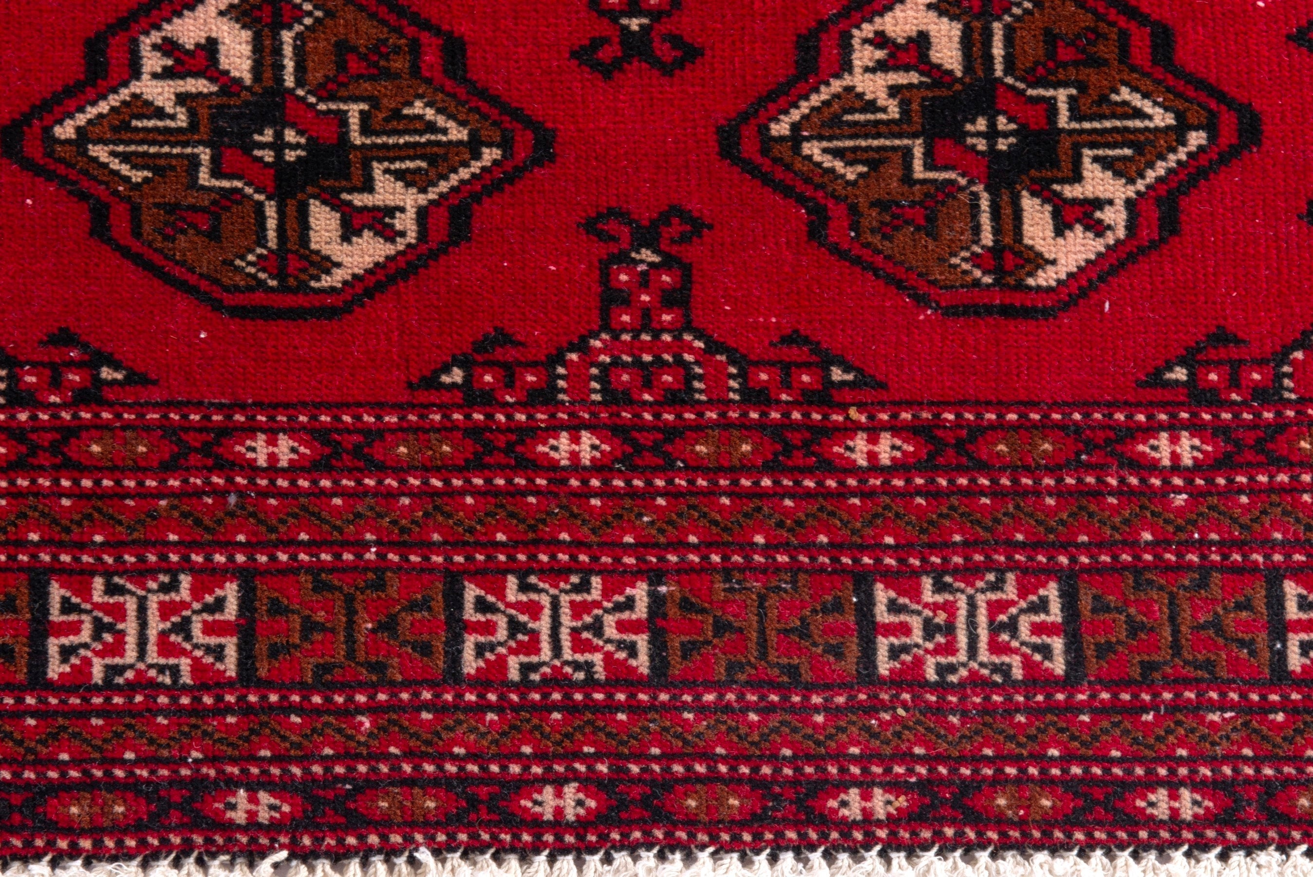 Persian Torkaman accent rug in deep red and tan, view 10 of 17