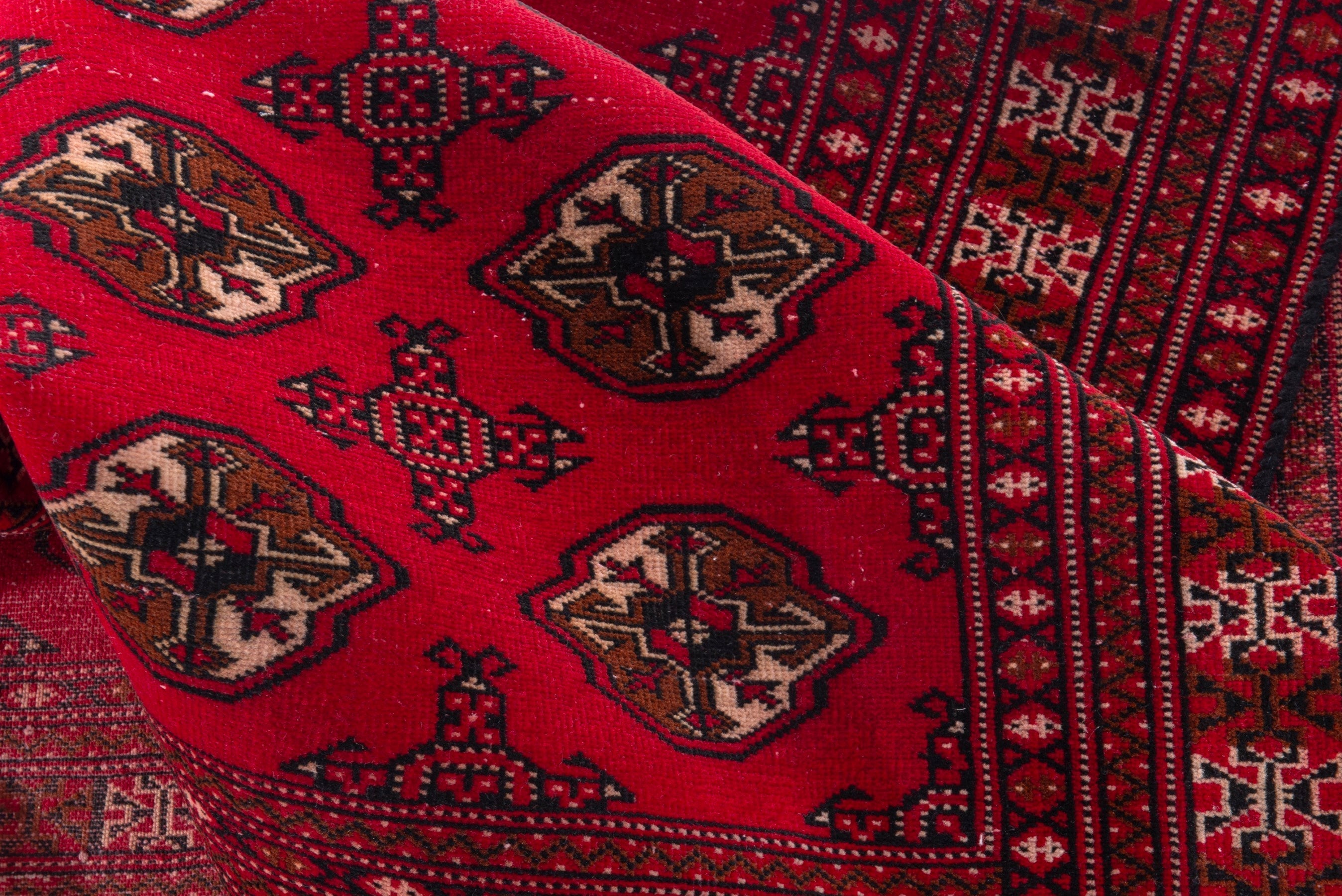 Persian Torkaman accent rug in deep red and tan, view 13 of 17