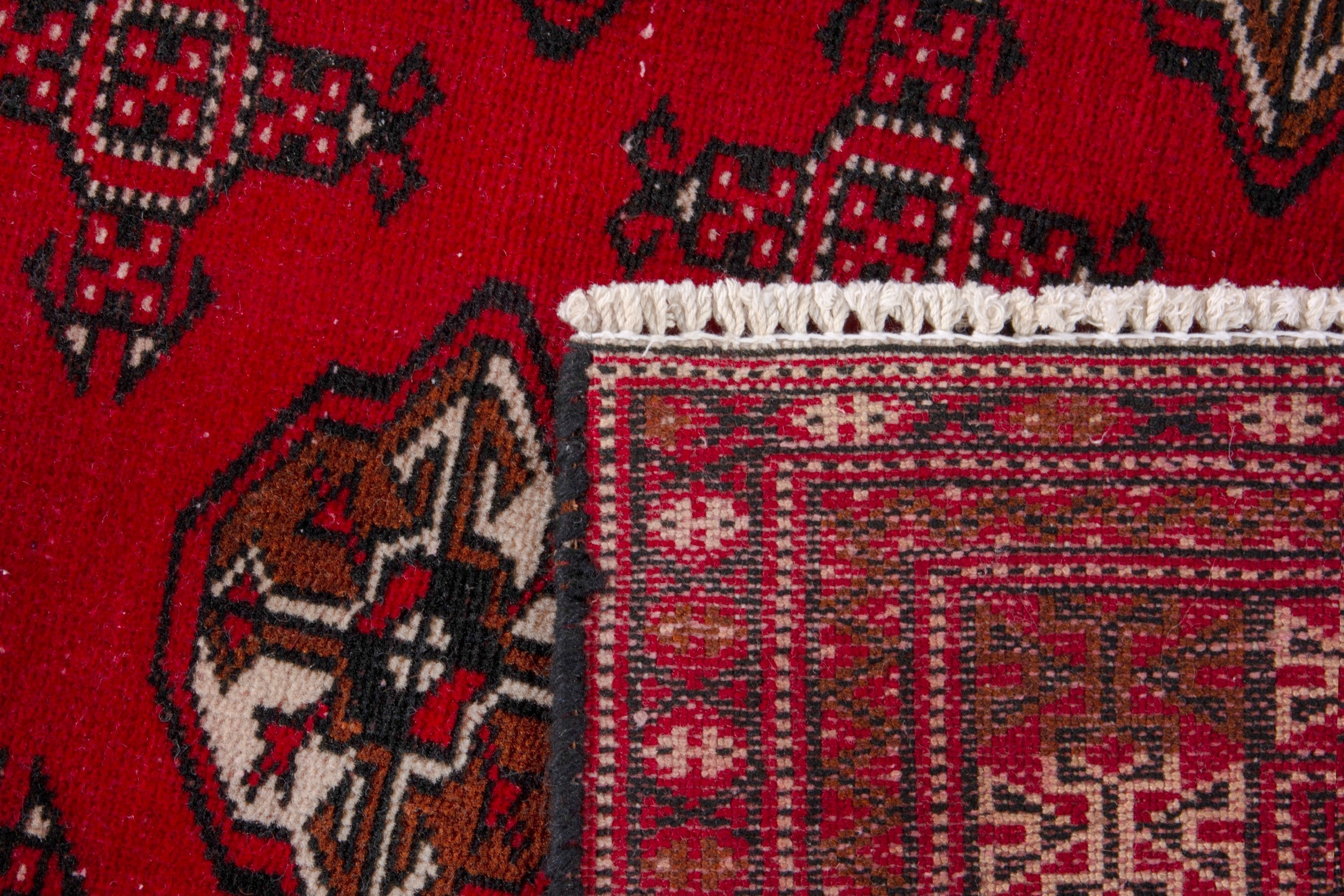 Persian Torkaman accent rug in deep red and tan, view 17 of 17