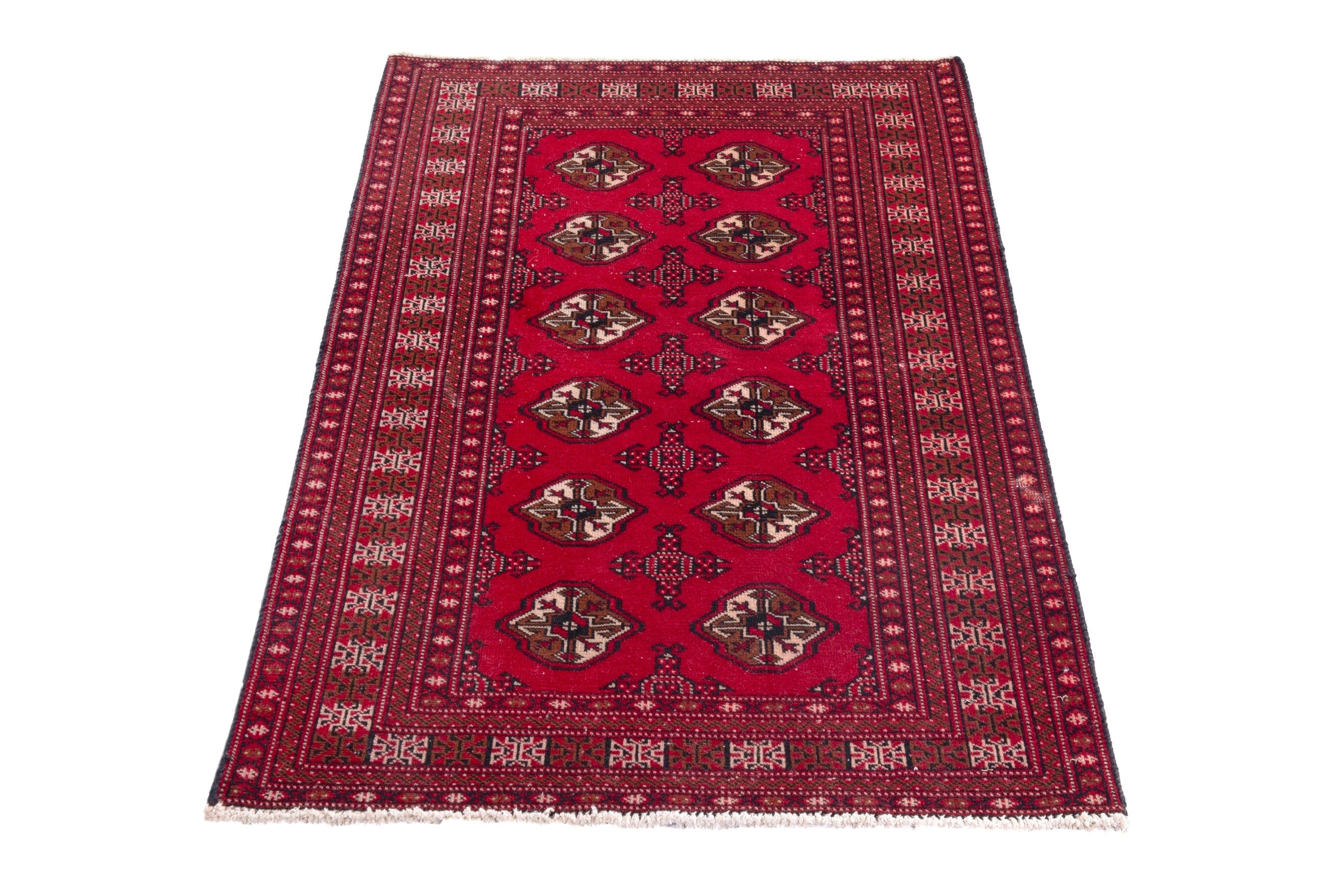 Persian Torkaman accent rug in deep red and tan, view 2 of 17